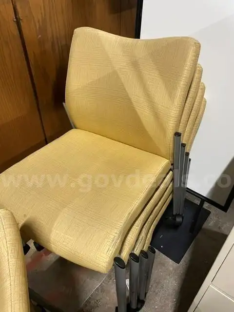 Lot of 12 Chairs on Casters that Stack