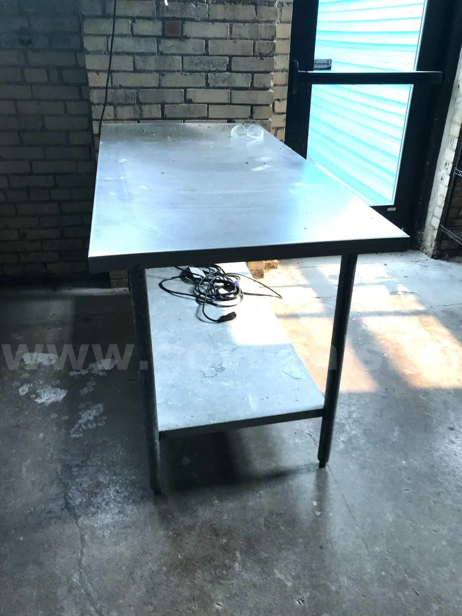 Used large stainless-steel table. (B1)