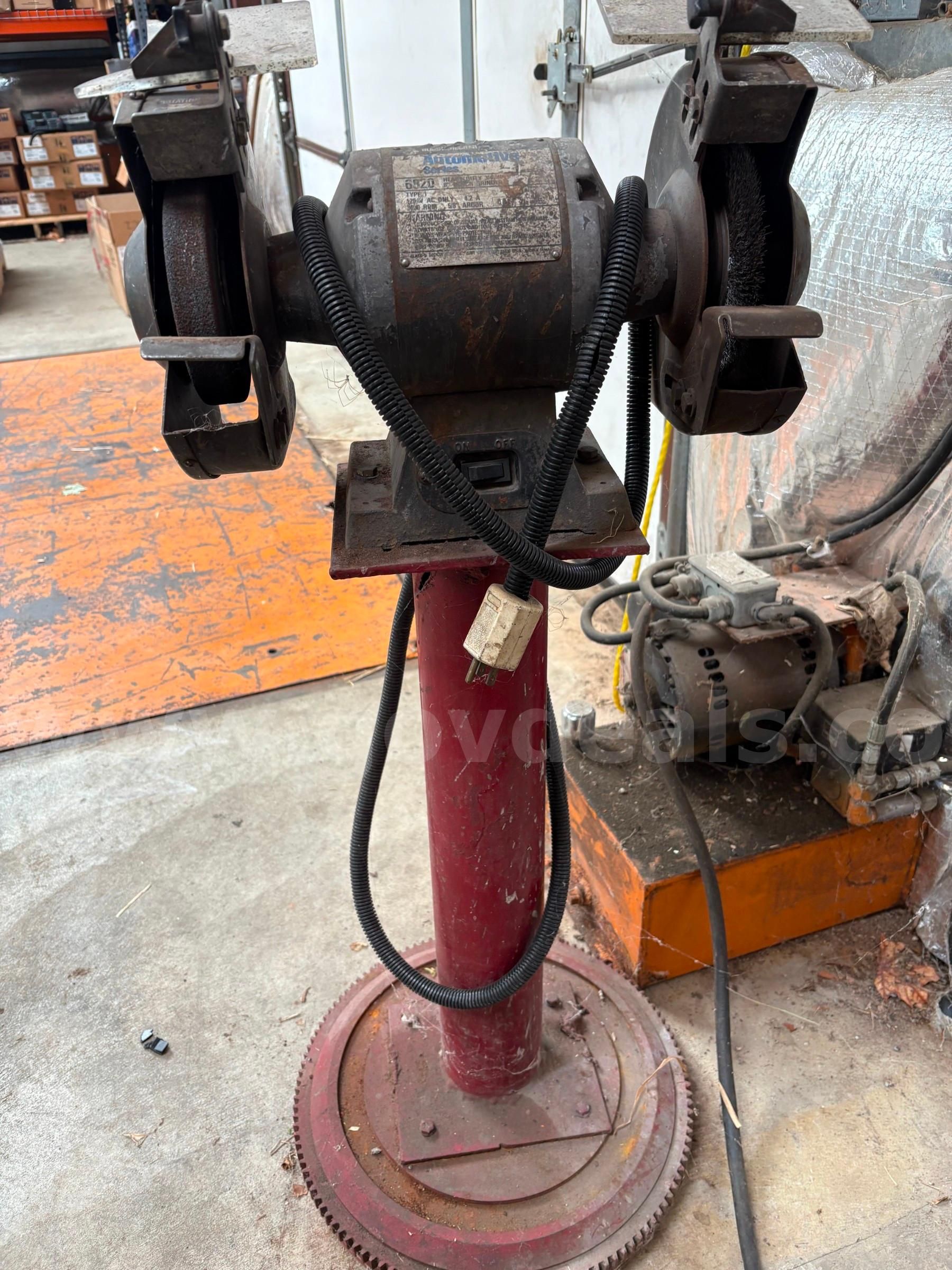 Black and decker Model 6820 Type 1 automotive bench grinder with stand.