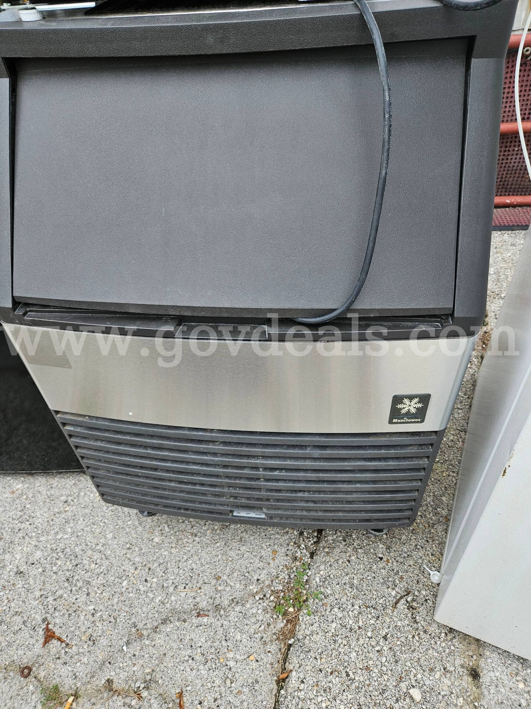 1 Black Stainless Manitowoc Ice Maker