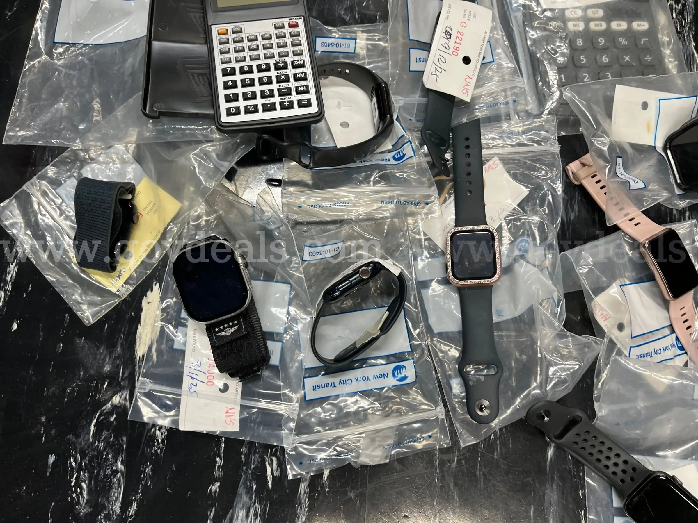 Lot of (98) Electronics - Apple Watch Calculators Cameras etc..