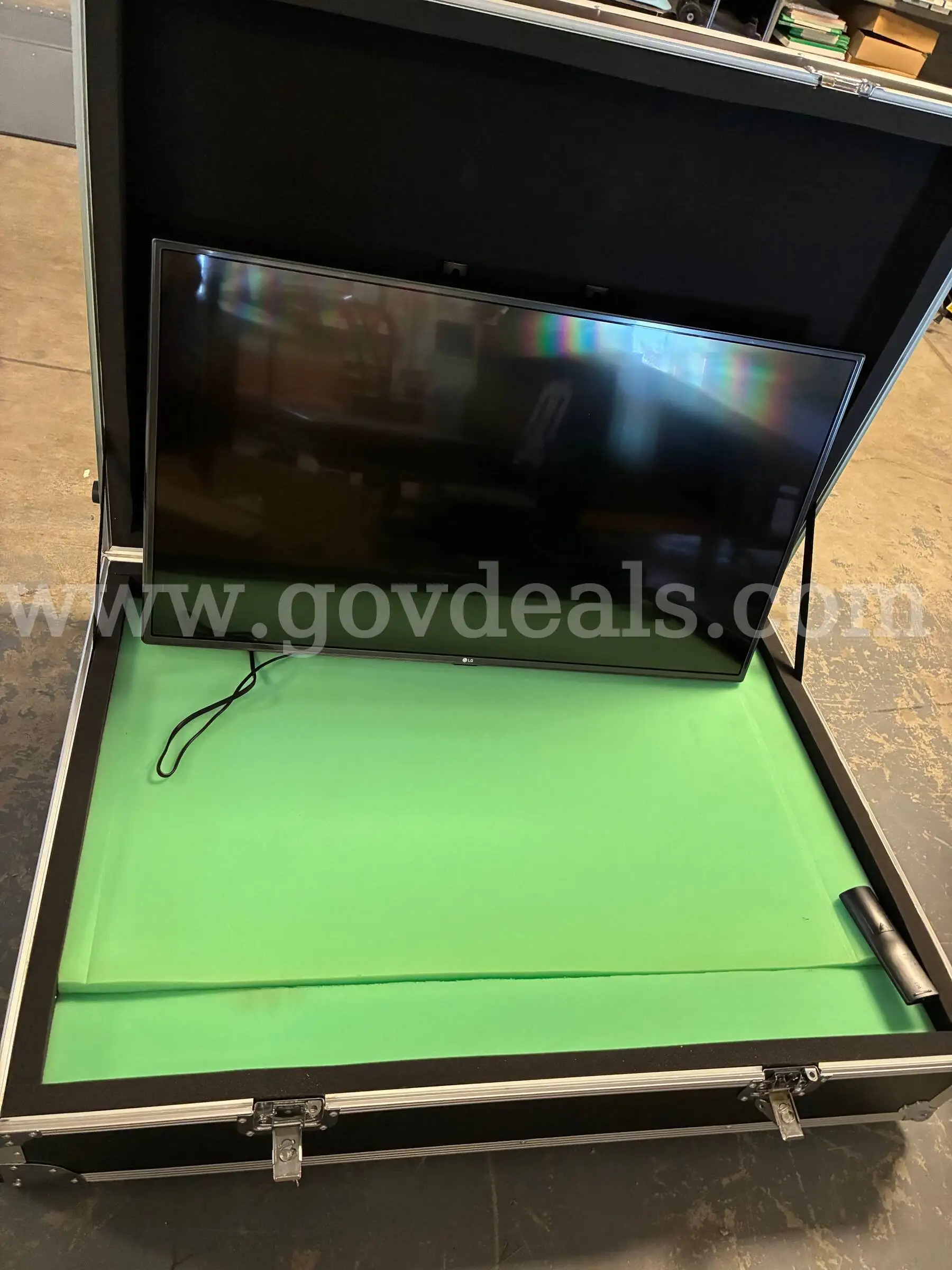 42 in LG TV in case with stand