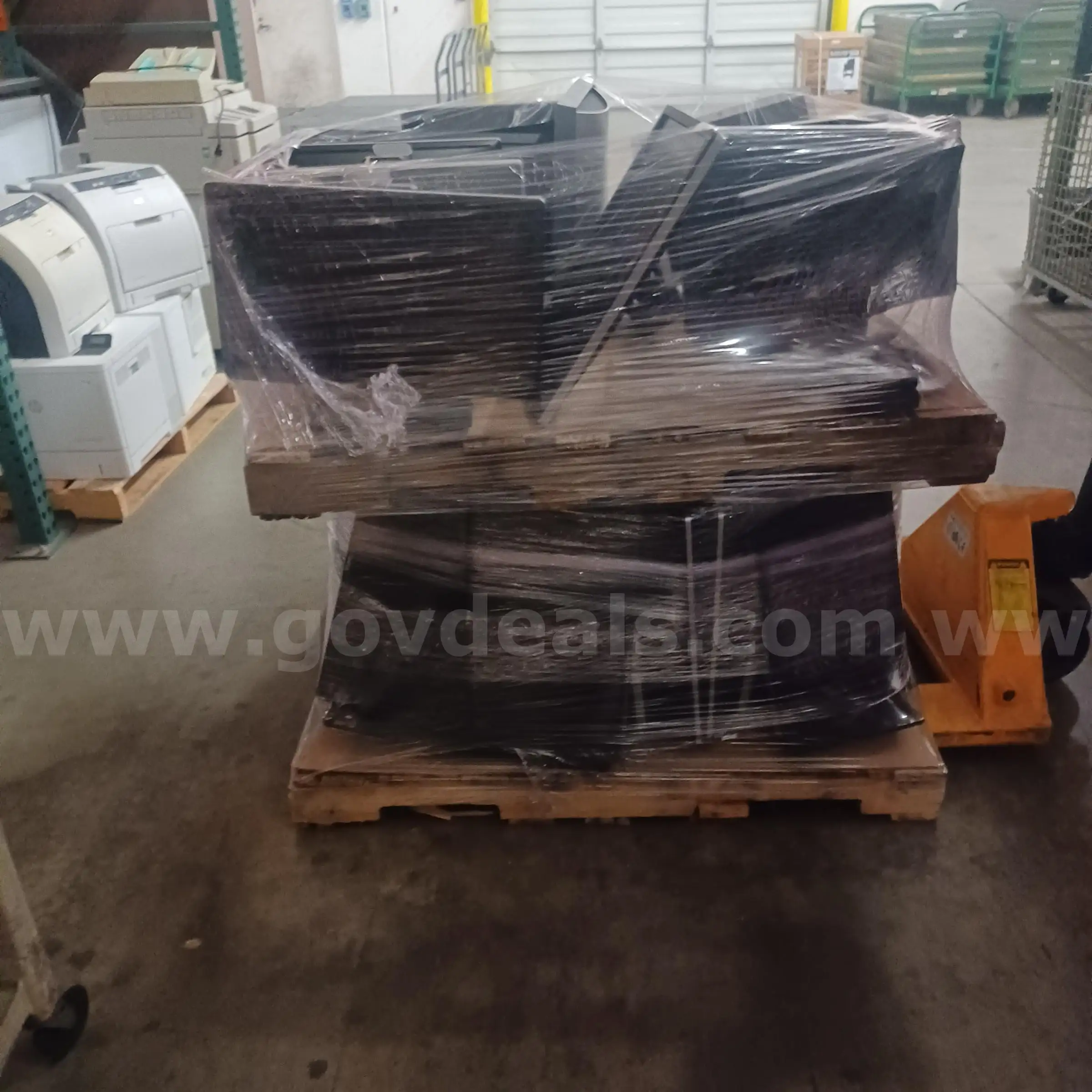 Pallet of various computer monitors