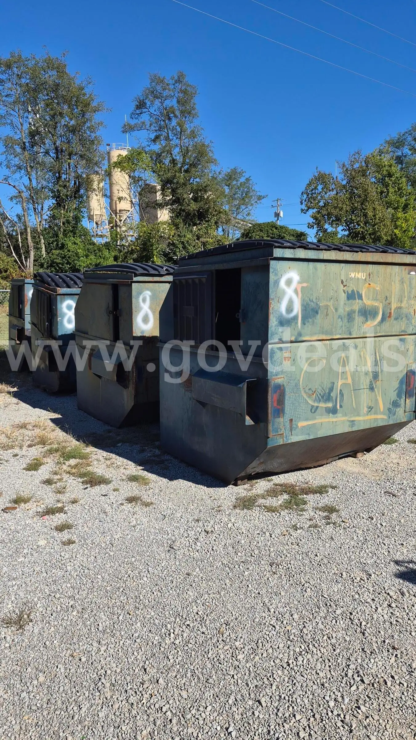 Four (4) 8 Yard Front Load Dumpsters