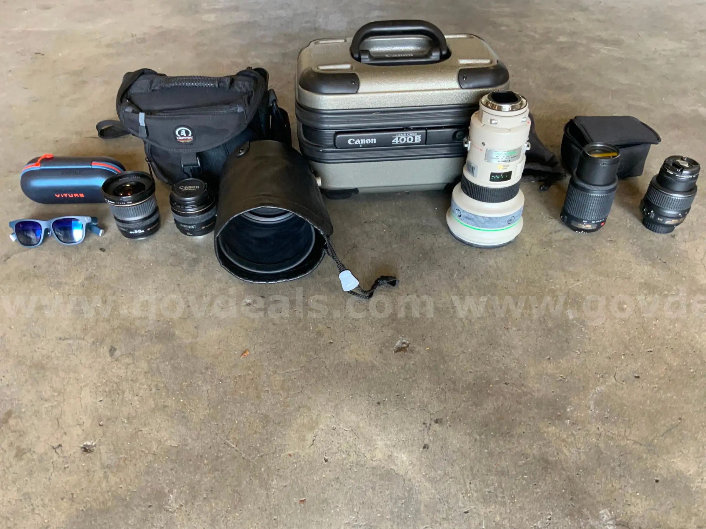 3 CANON CAMERA LENS 2 NIKON CAMERA LENS 3 CISCO PRECISION HD CAMERAS AND 1 VITURE ONE XR AR GLASES 1