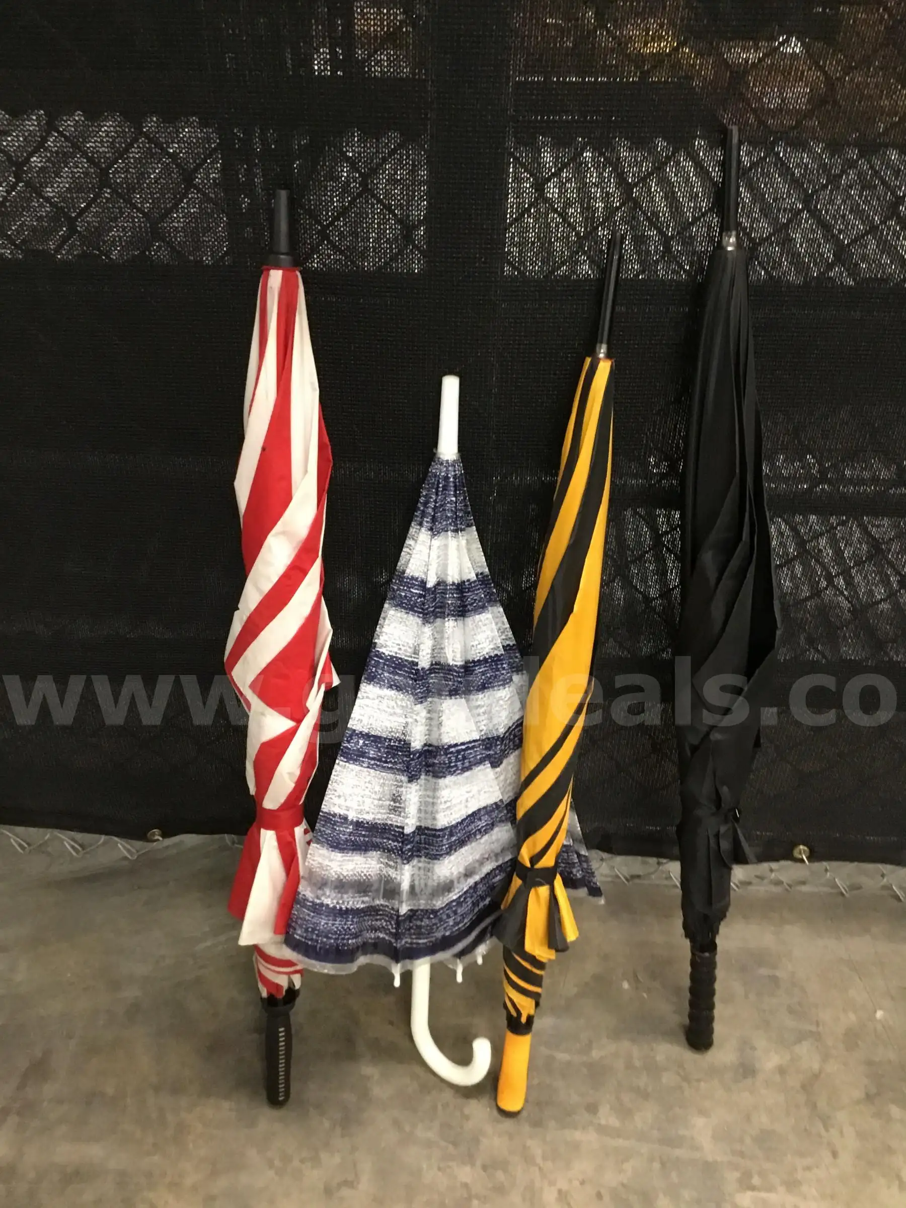 red & white striped umbrella yellow & black striped umbrella navy blue & white striped umbrella blac
