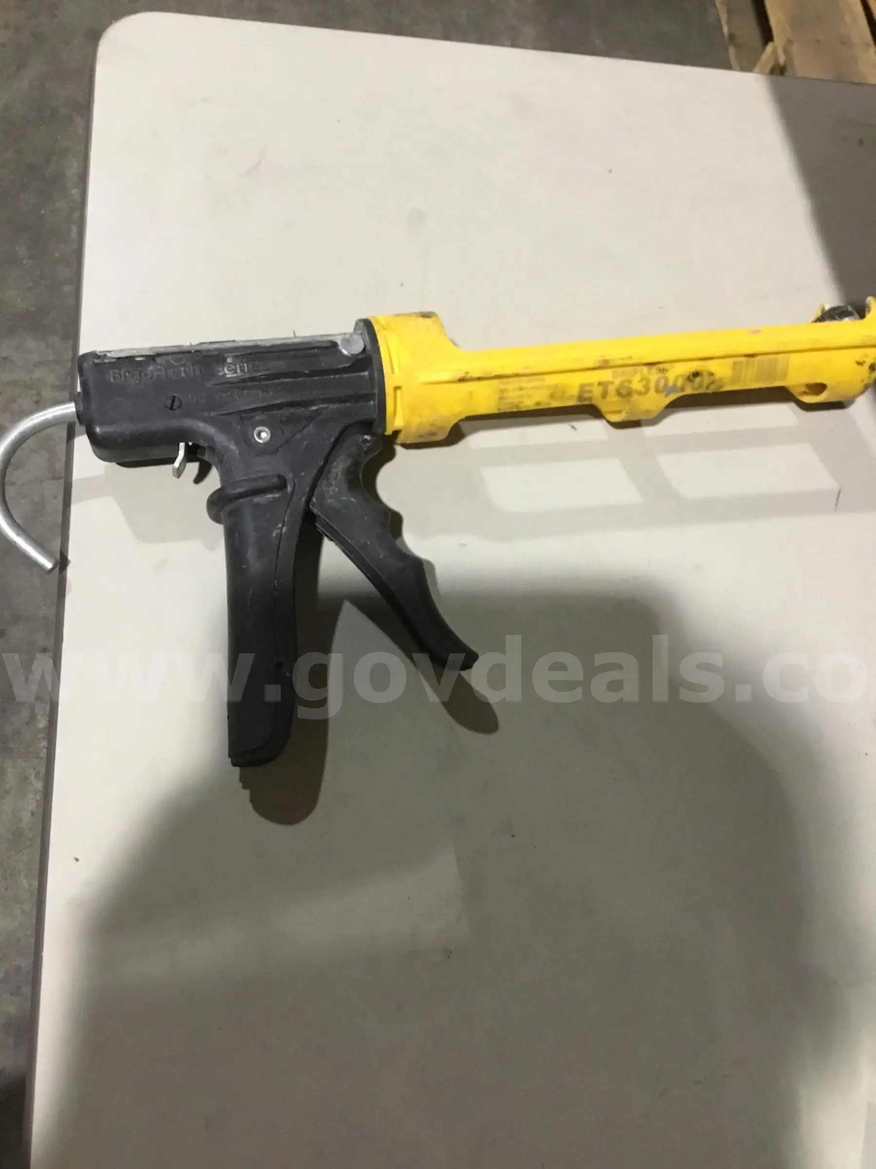 16 inch yellow & black Ergo Tech Series caulk gun “DH”
