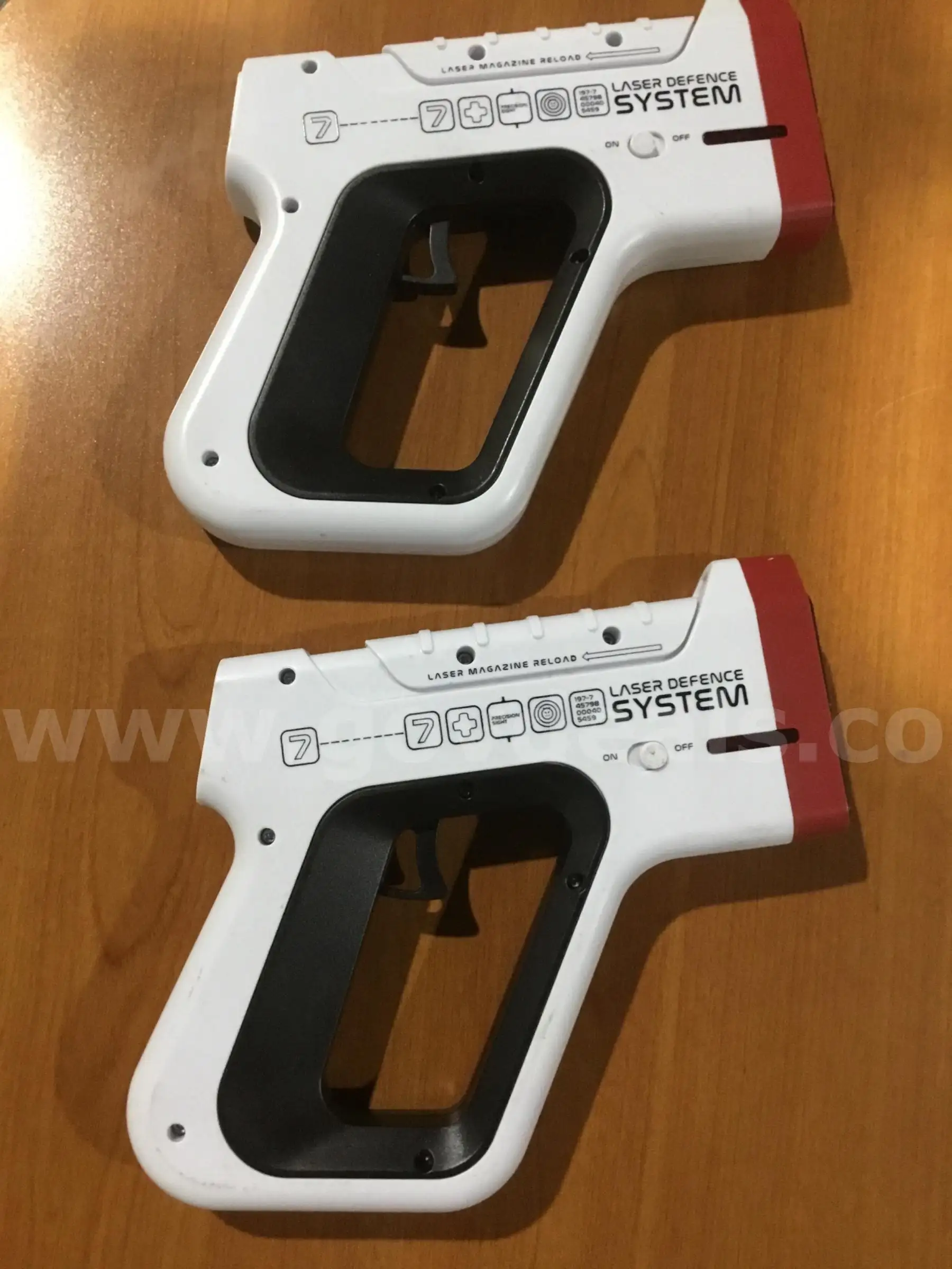 Two 7 inch white laser defense toy guns (BATTERIES INCLUDED) “DH”