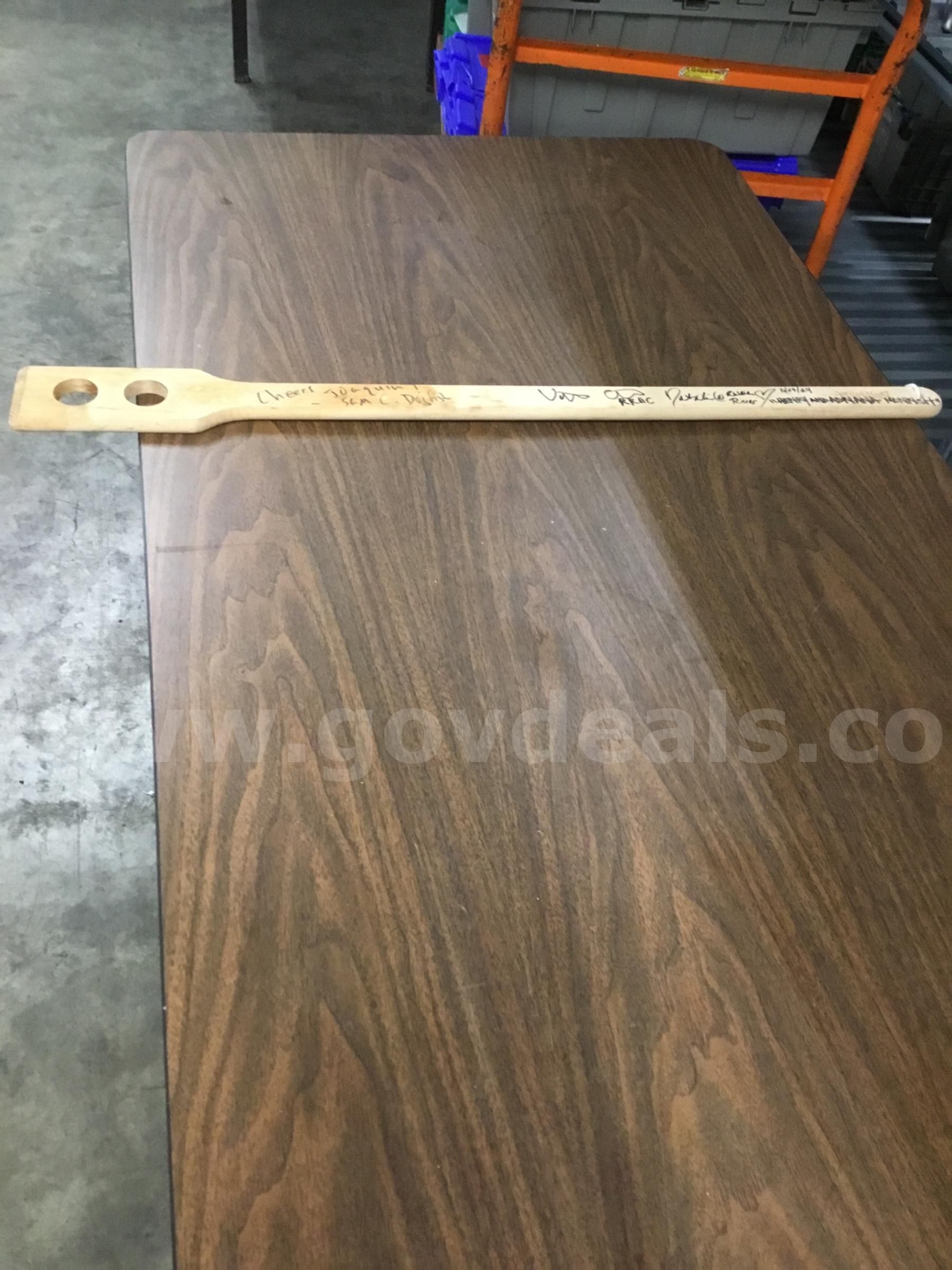 35 inch light oak paddle with signatures of names written “DH”