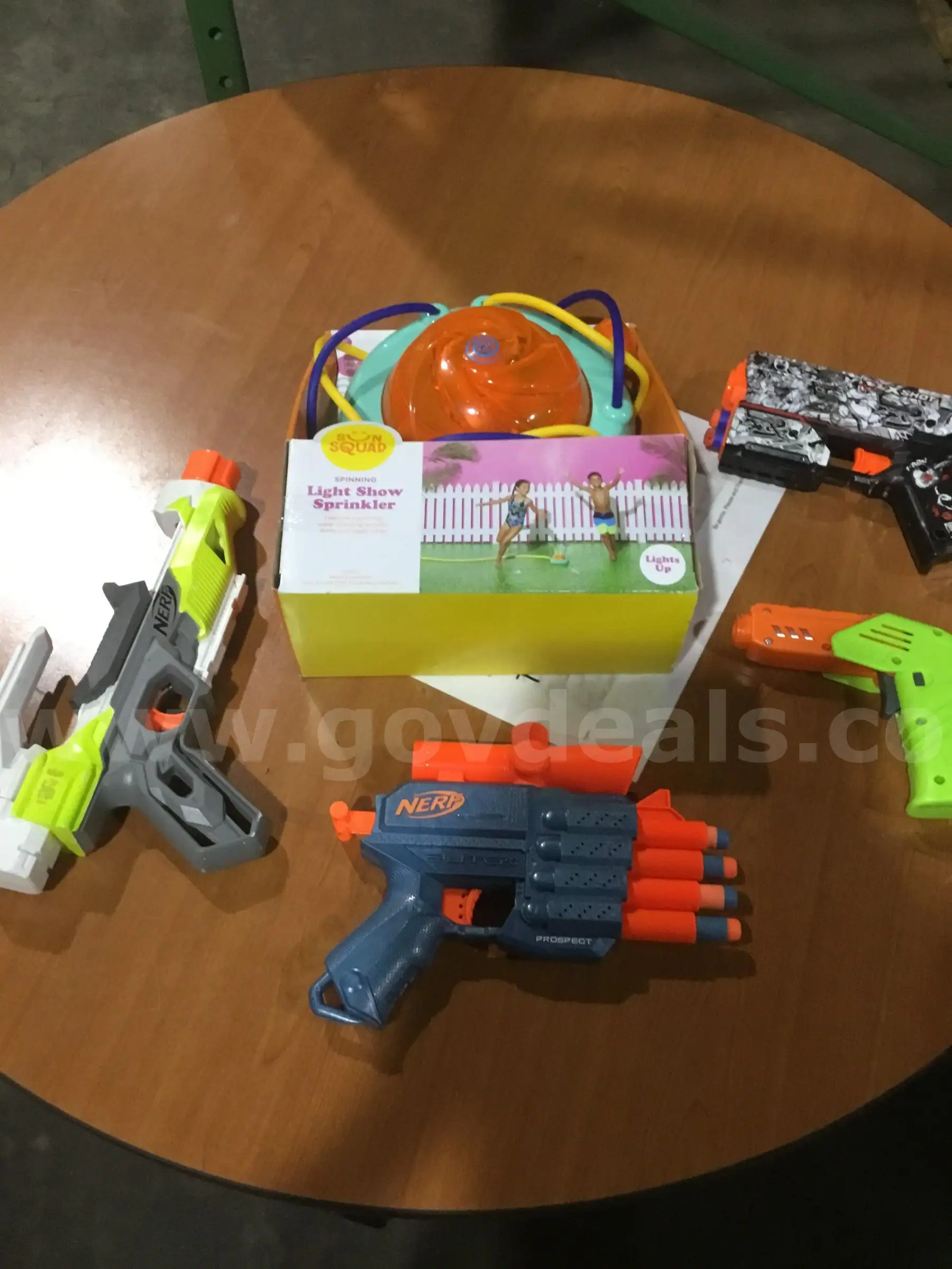 Lot of items-Spinning sprinkler misc toy guns DH