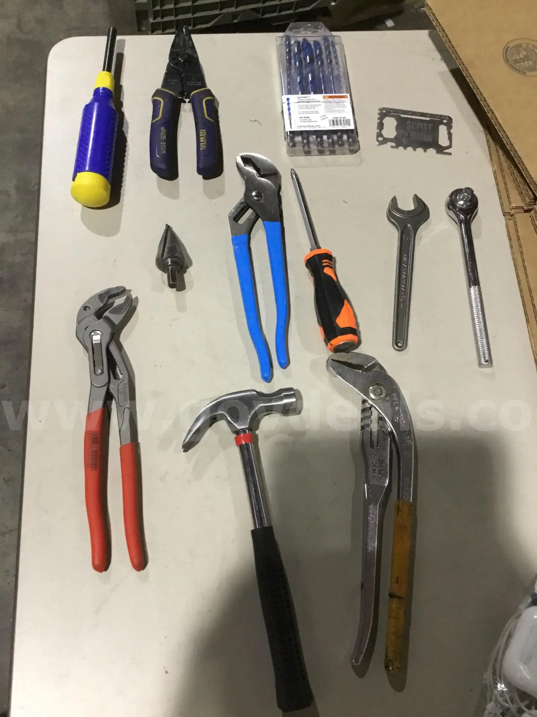Lot of items-silver pipe wrench pliers with yellow padding DH