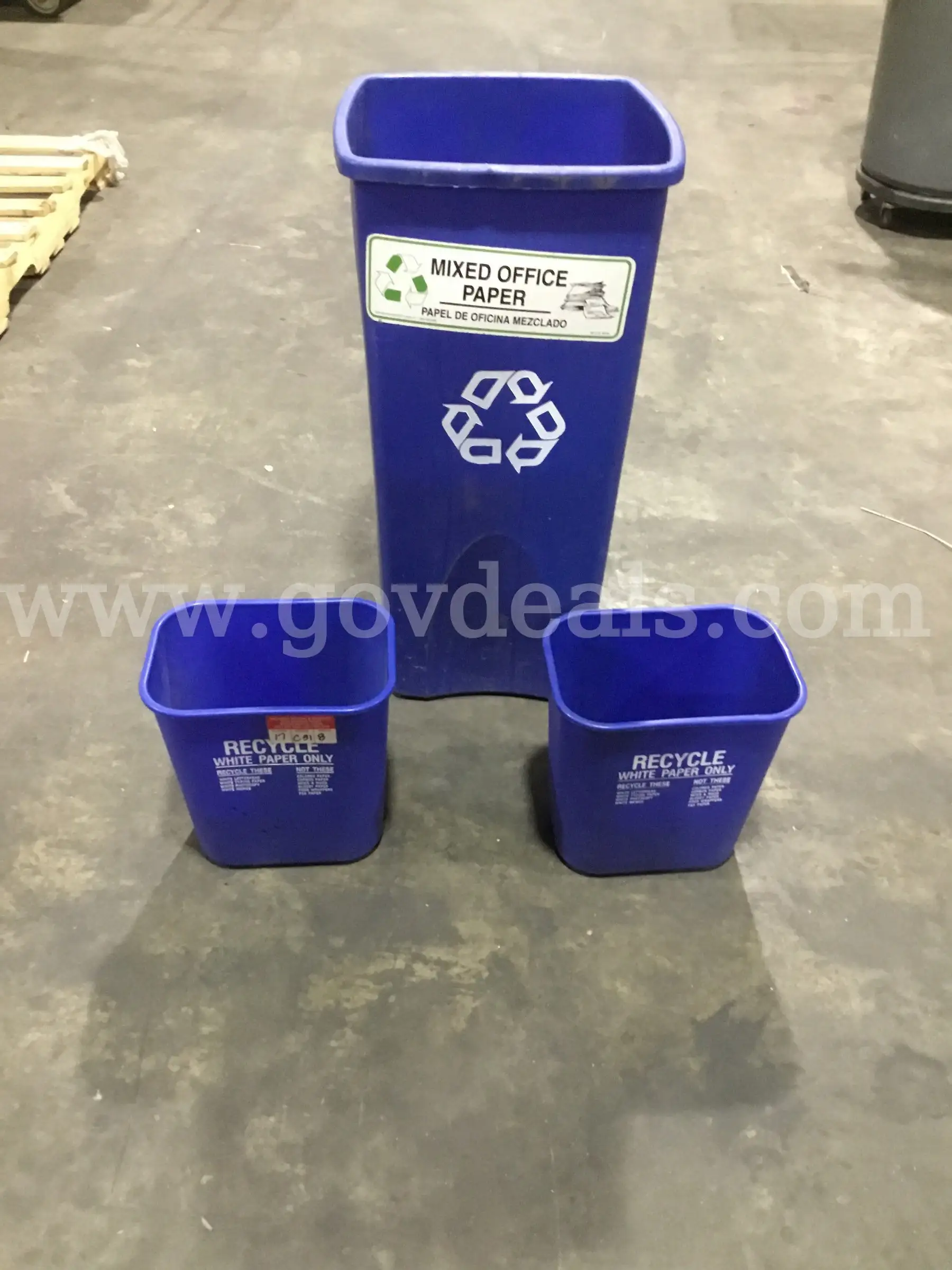 Two 11 inch blue trash cans & a 15 x 15 x 30 blue trash can DH