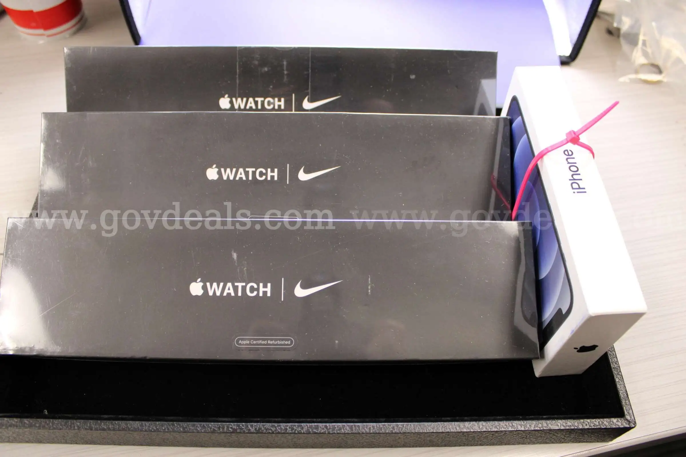3 Apple Watches 1 IPhone