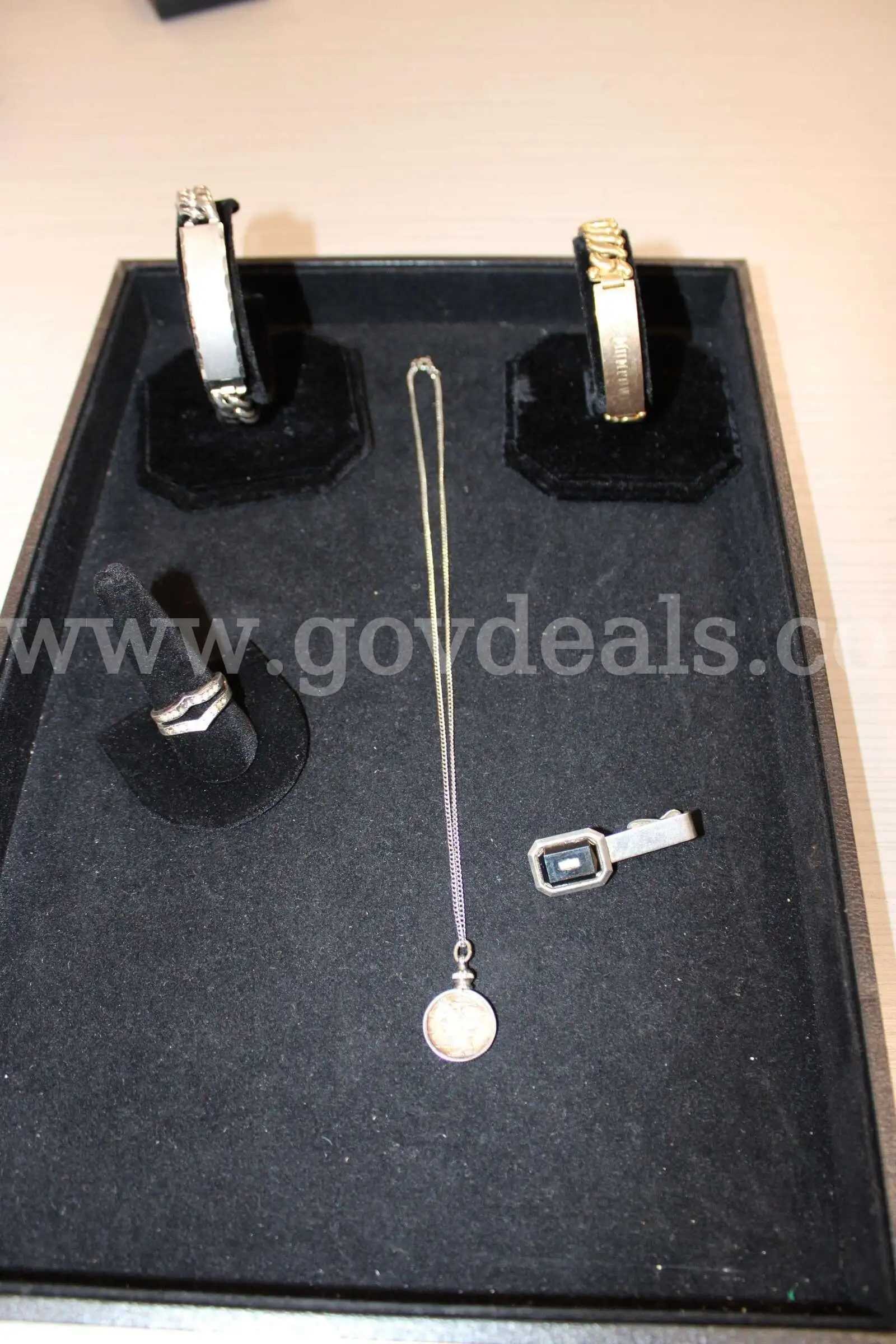 RING (1) TIE TAC (1) BRACELET (2) NECKLACE (1)