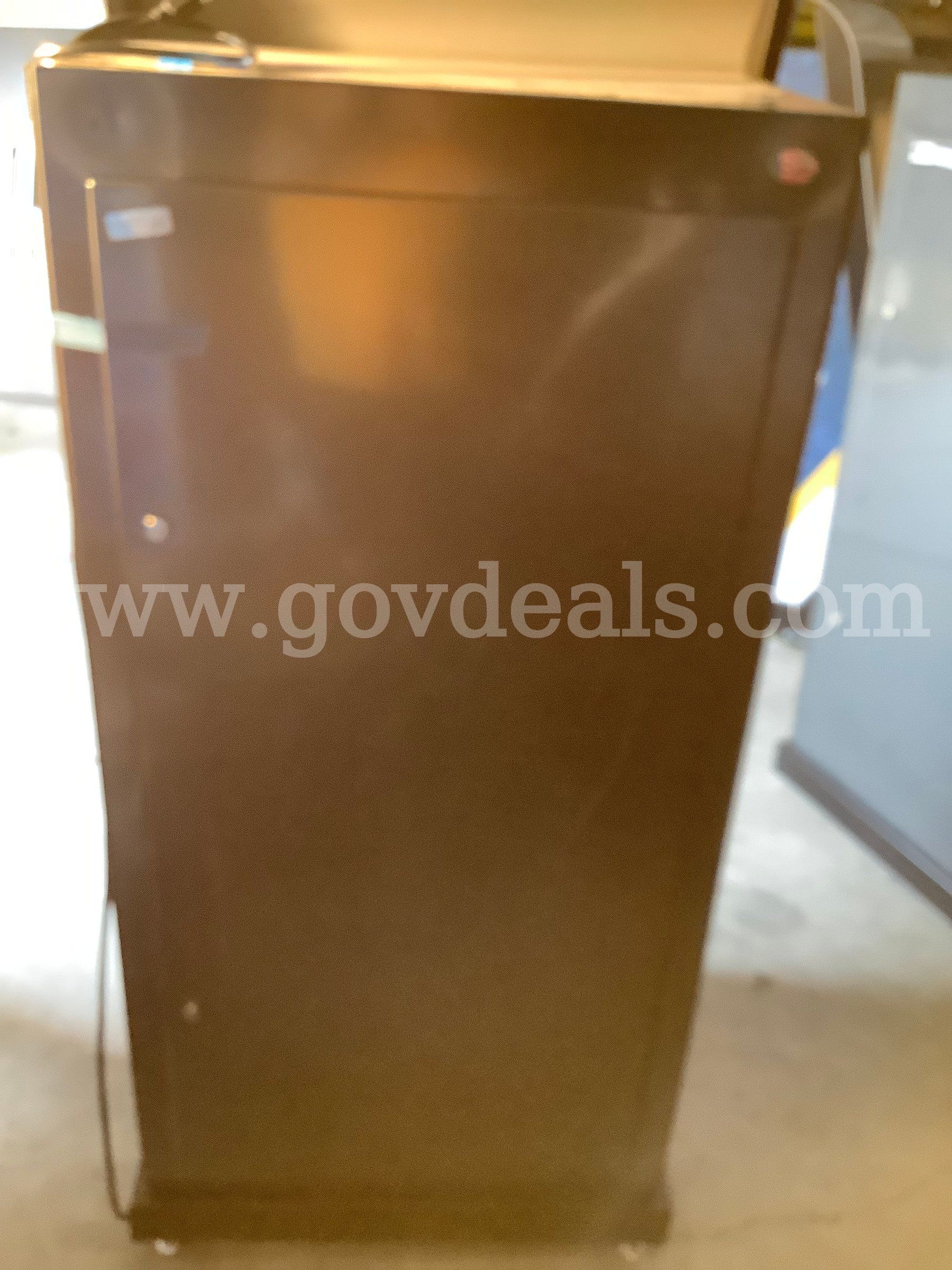 Holds 12 laptops machine is 30x29x60