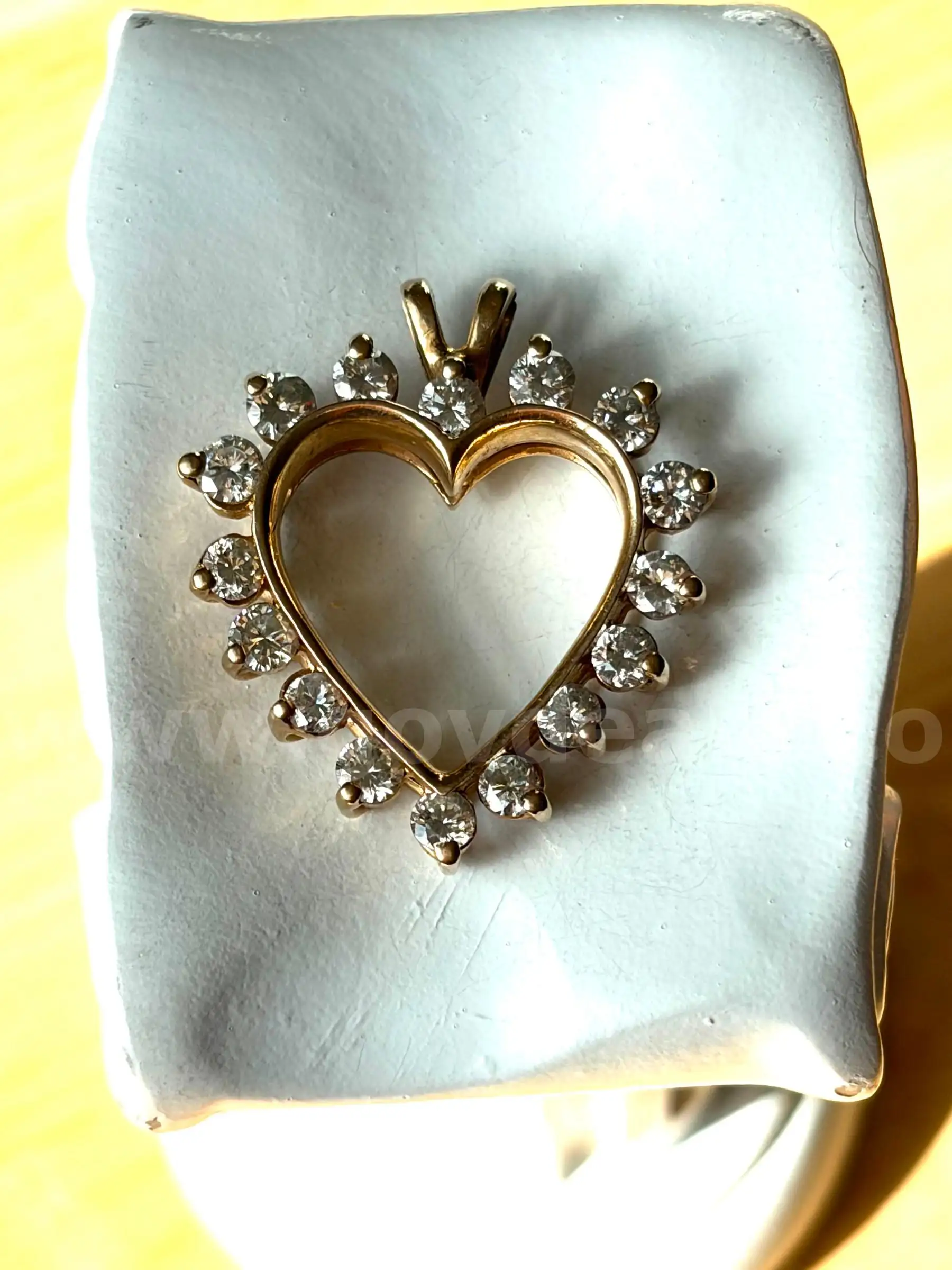 TiDDRs 14k Gold Heart Pendant with 16 Diamonds (1.6 ctw). Evaluated by a jeweler. 5.1 g total weight