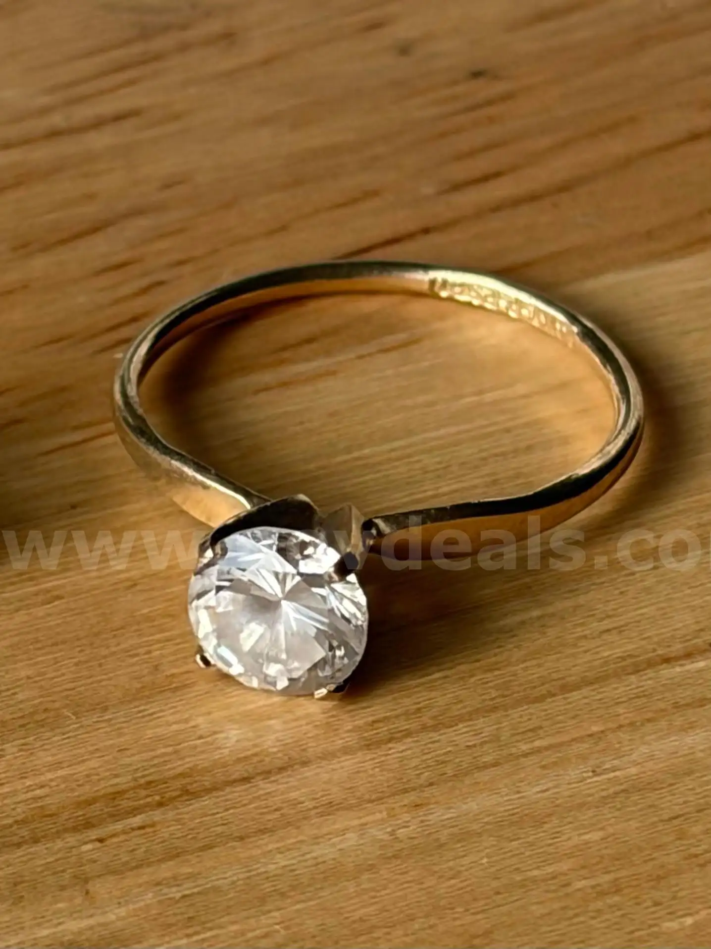 TiDDRs 14K Gold Classic Engagement Ring with Cubic Zirconia. Size 7. Confirmed by jeweler.