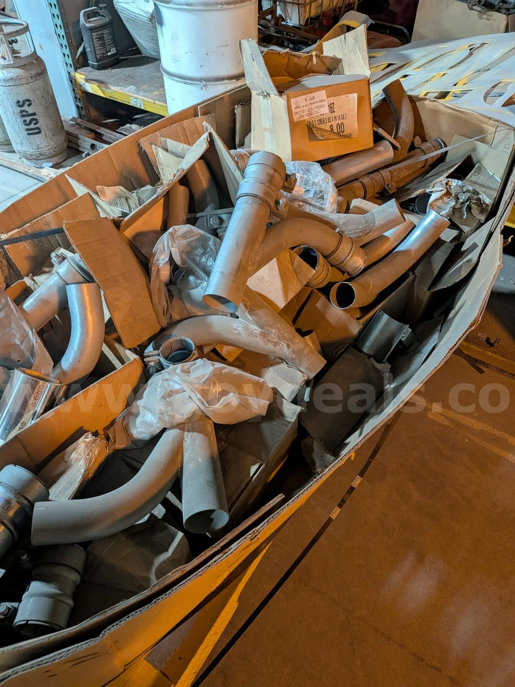 Box of Connectors clamps and straight Pipes