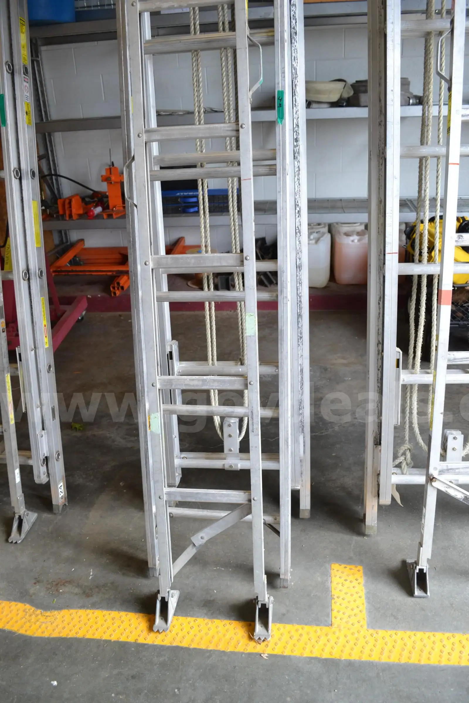 LOT TO INCLUDE ALCO LITE 10 FOLDING ATTIC LADDER 16 ROOF LADDER AND A 28 2-SECTION EXTENSION LADDER