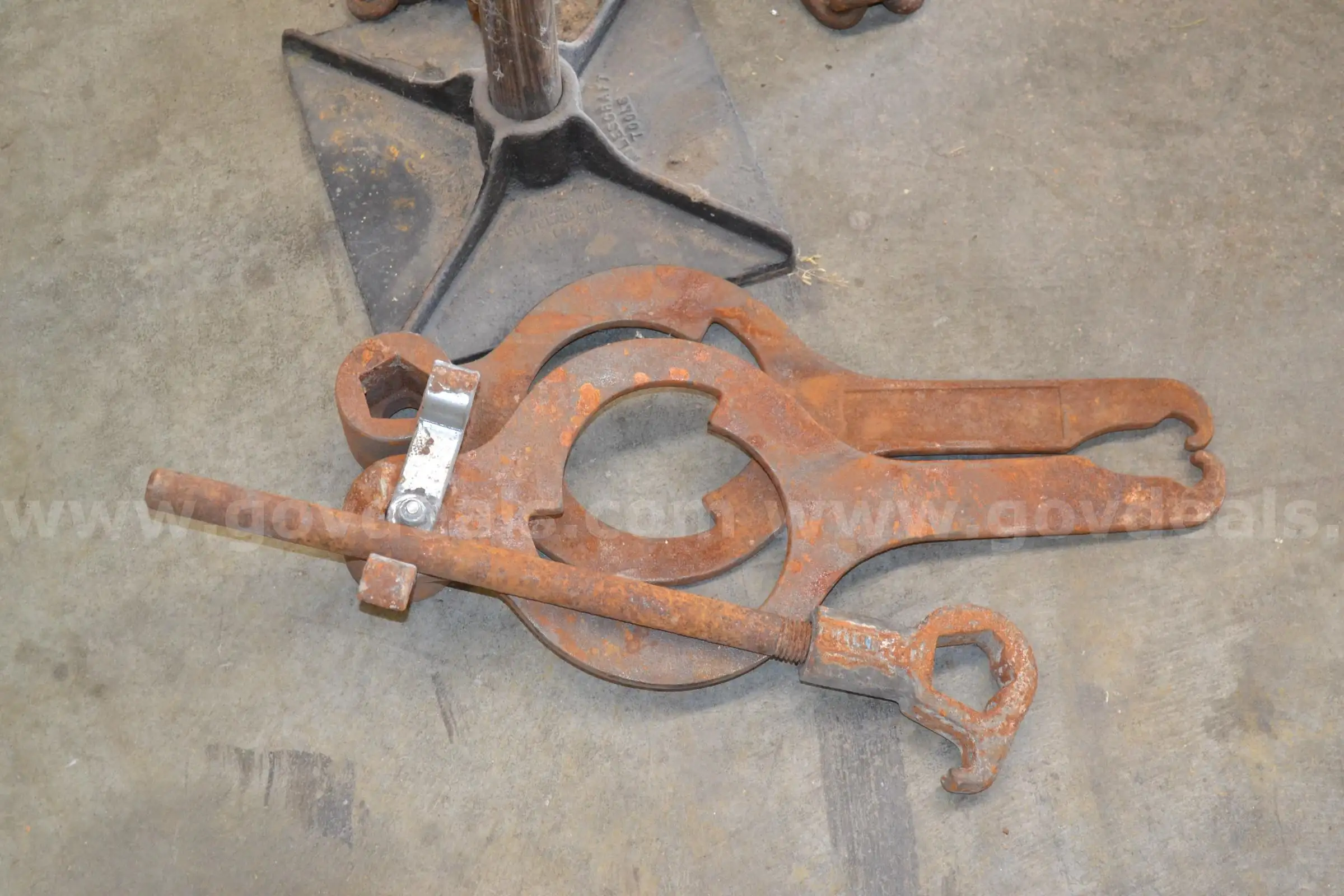 Lot to include Three (3) antique style hydrant wrenches Ground Dirt Tamper with wooden handle and On