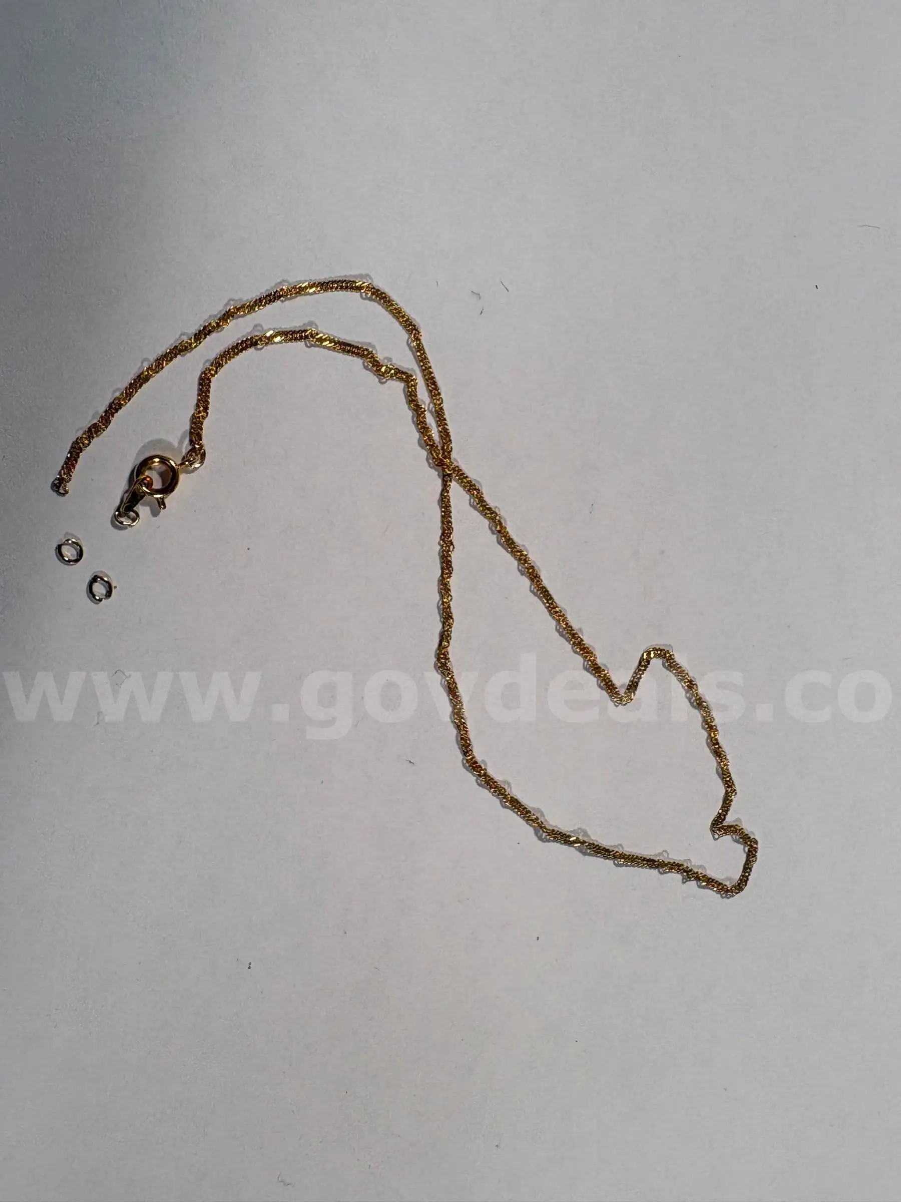 broken yellow gold plated chain