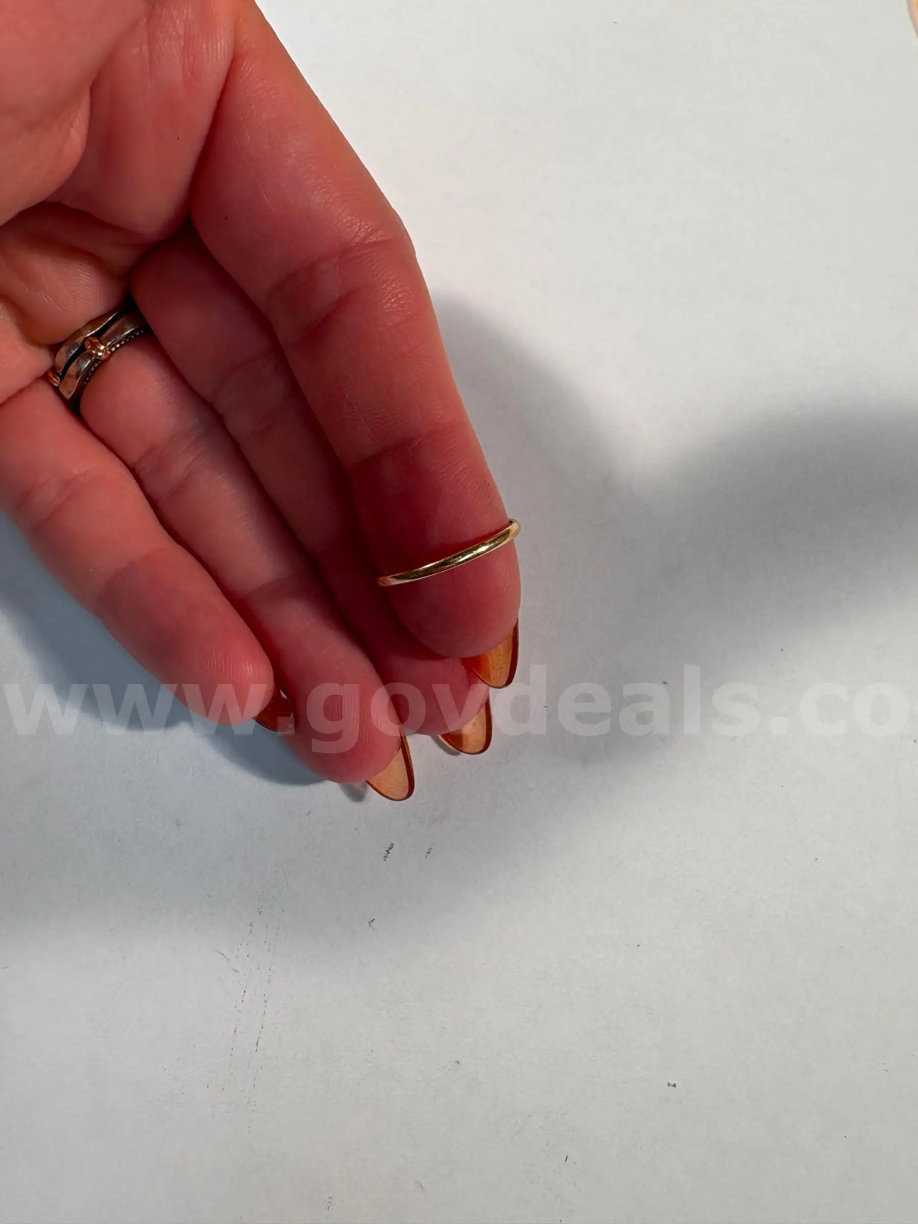 thin 10KT stamped yellow gold ring band