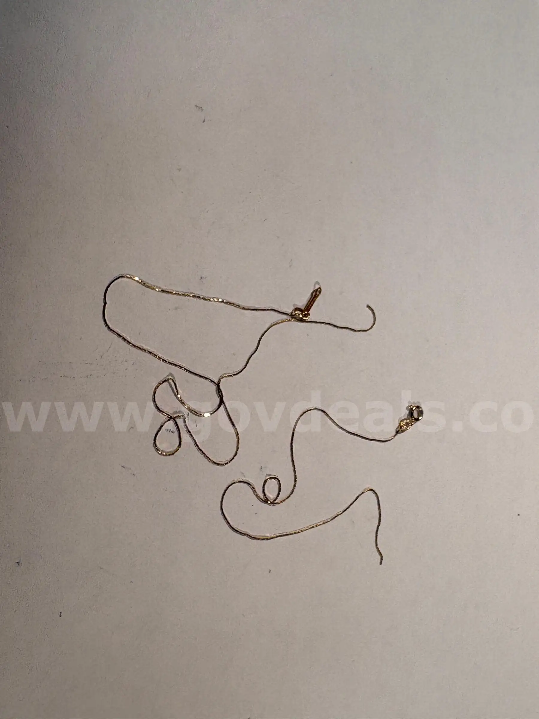 broken 14KT yellow gold chain .3DWT weight