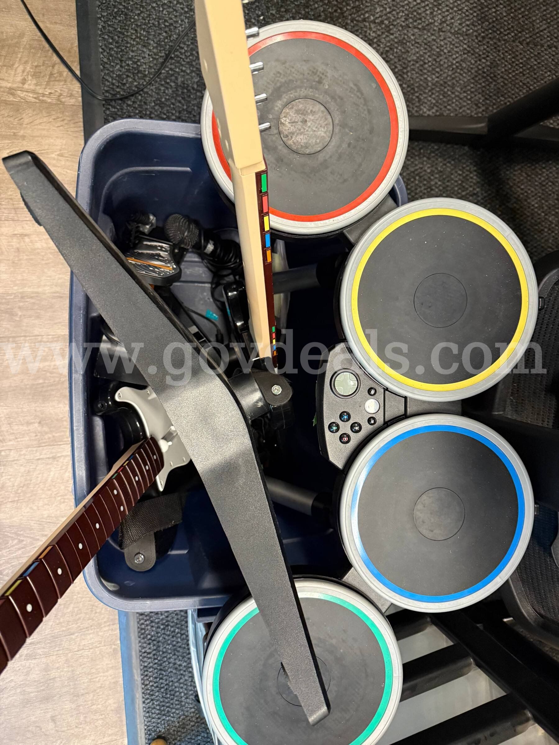 Rock Band equipment (drums guitars microphone foot pedals)