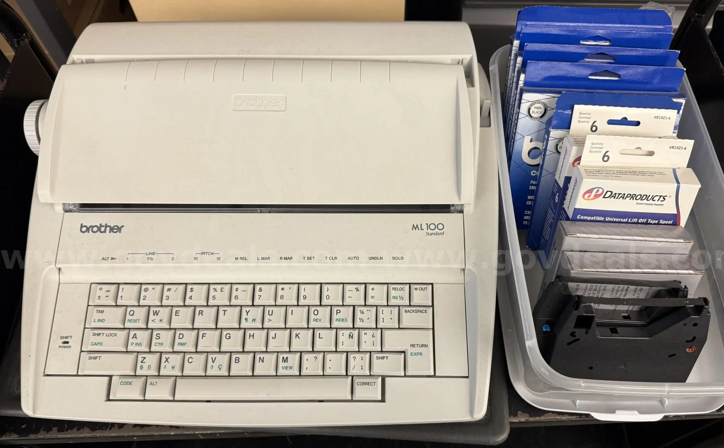 Brother ML 100 Standard typewriter with lid various ribbons and corrective film ribbons and cushione