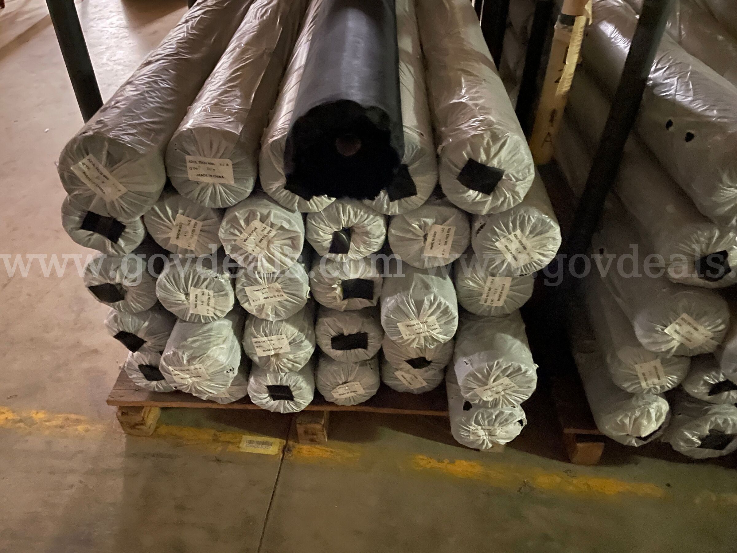Large Lot of New Black & Gray Fabric Material Rolls Approx. 270 Rolls (9 Pallets)