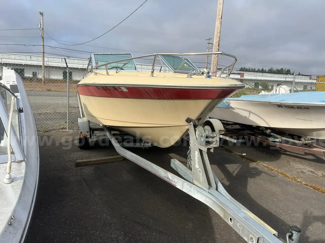 Century Boat with inboard engine and Escort Tailer.