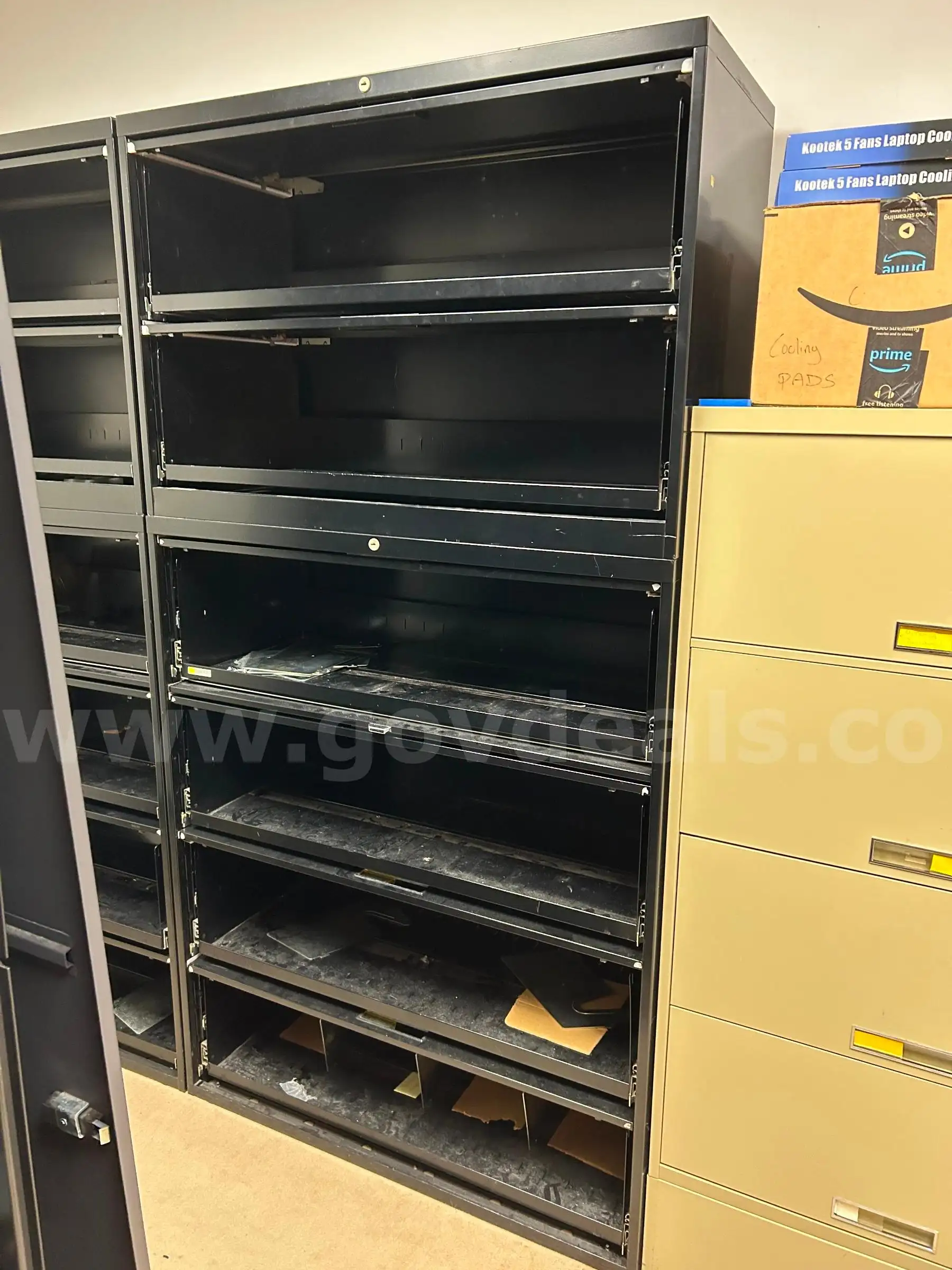 Tall black file cabinet