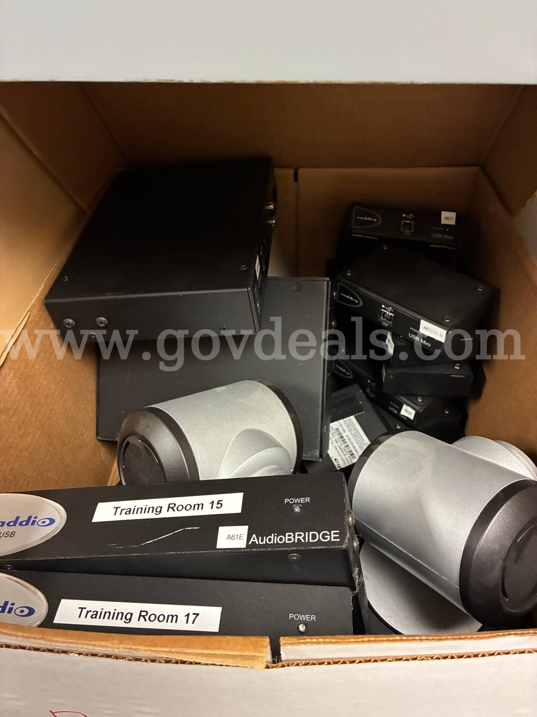 Misc. Conference Room Equipment Poly Coms Cameras metal shelves and cords.