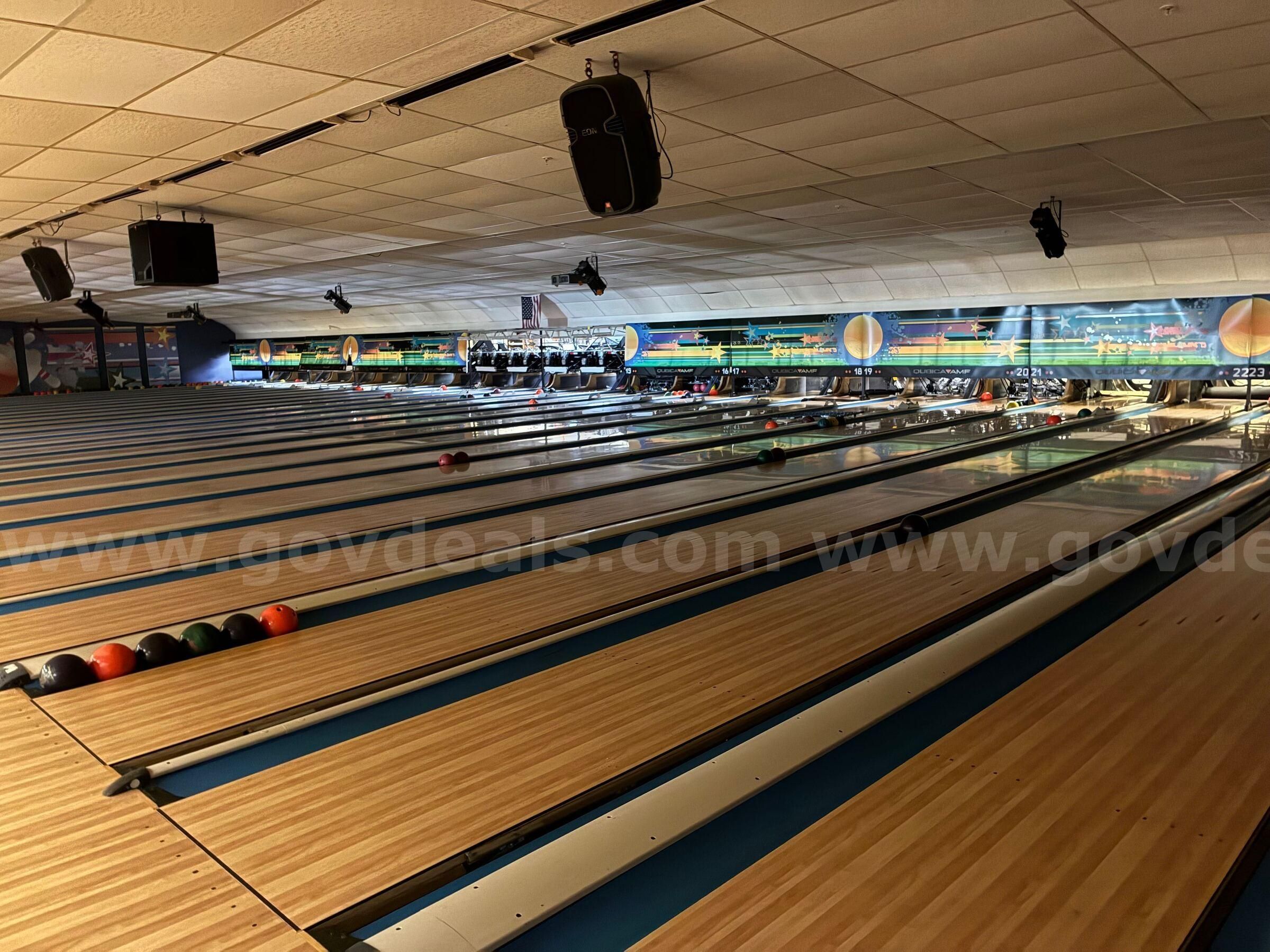 Lot of 24 QubicaAMF 90XLi Bowling Pinspotters & Bowling Alley Wood Flooring