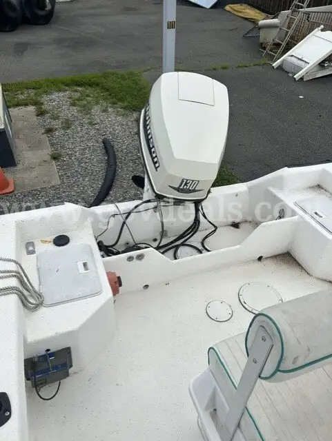 18 ft. Key Largo Fiberglass Boat 130 HP 4 stroke outboard motor with trailer