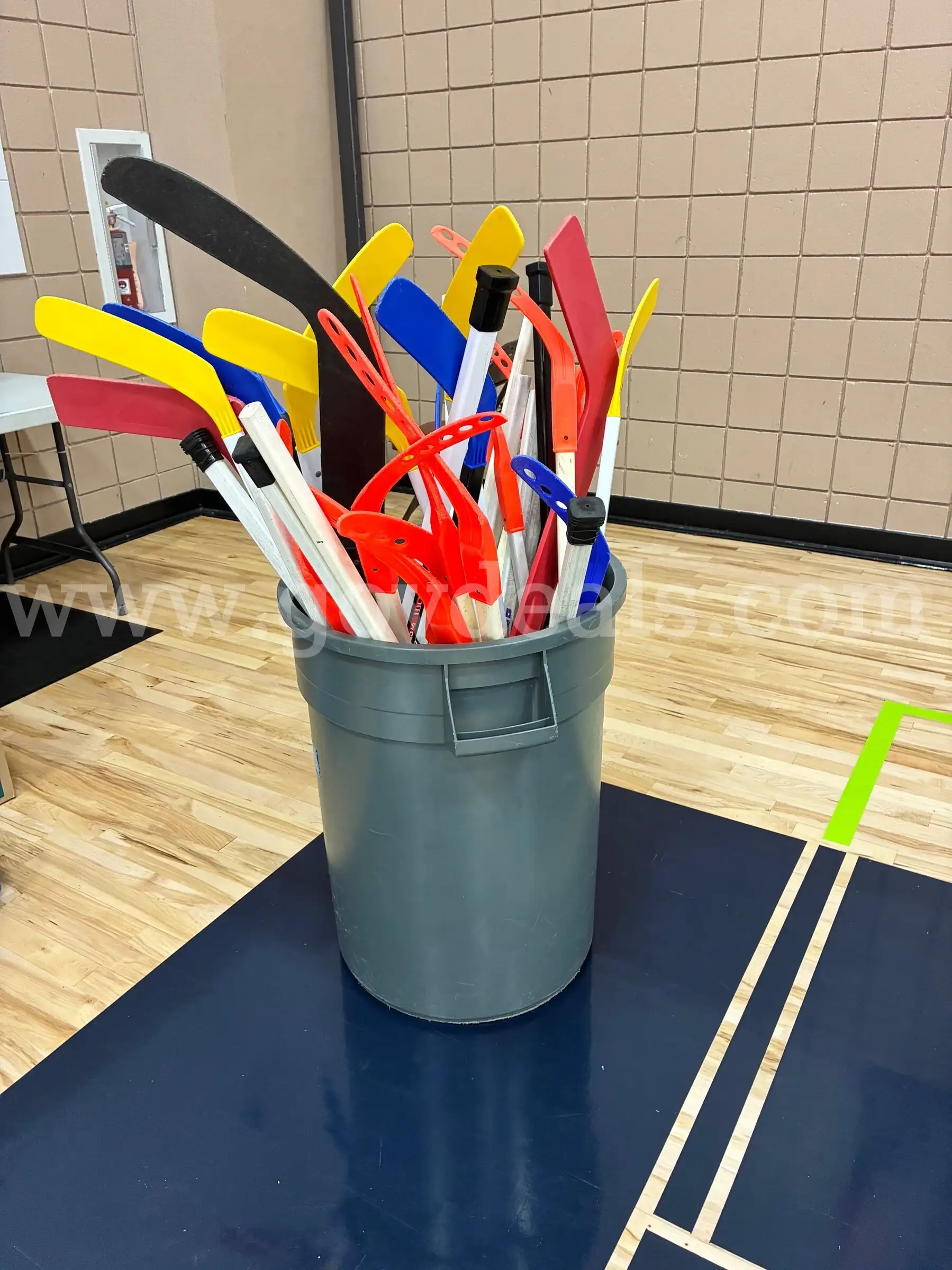 Lot of Plastic Hockey Sticks