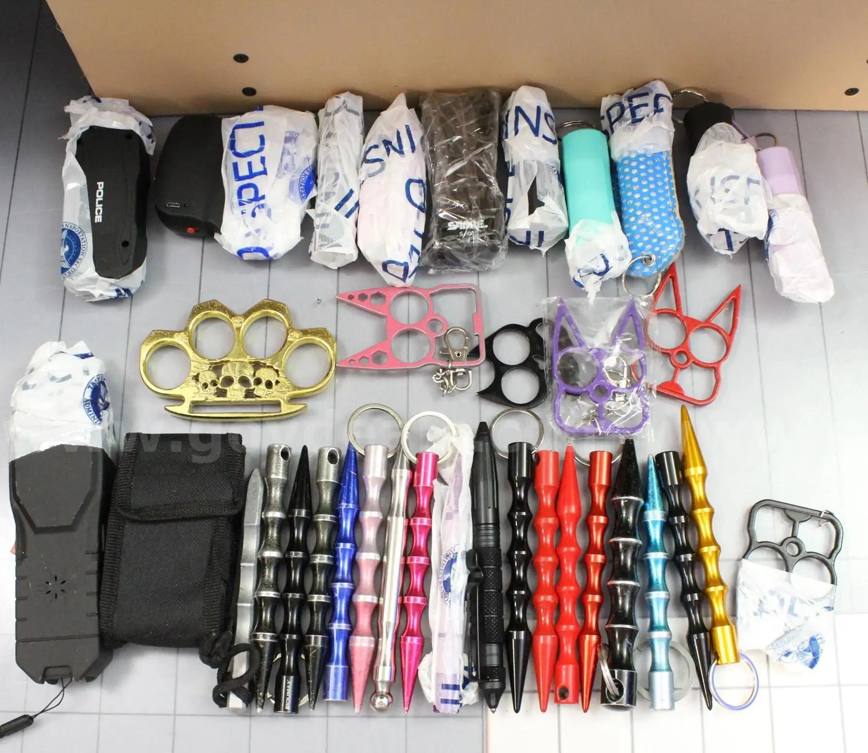 Approximately 4 lbs. of Assorted Self Defense Items #36227