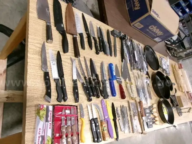 Lot of Cast Iron Skillets Rolling Pins Various Knives and Utensils.