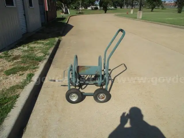 One (1) Green Metal Mobile Hose Reel