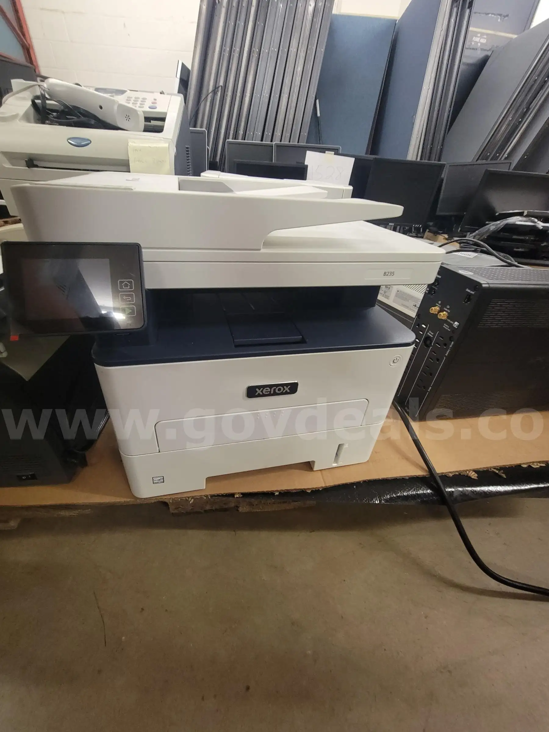 LOT OF 38 (DOCKING STATIONS PRINTERS WIRELESS HEADSETS FAXER APC BACK-UPS SPEAKER AND MIFI)