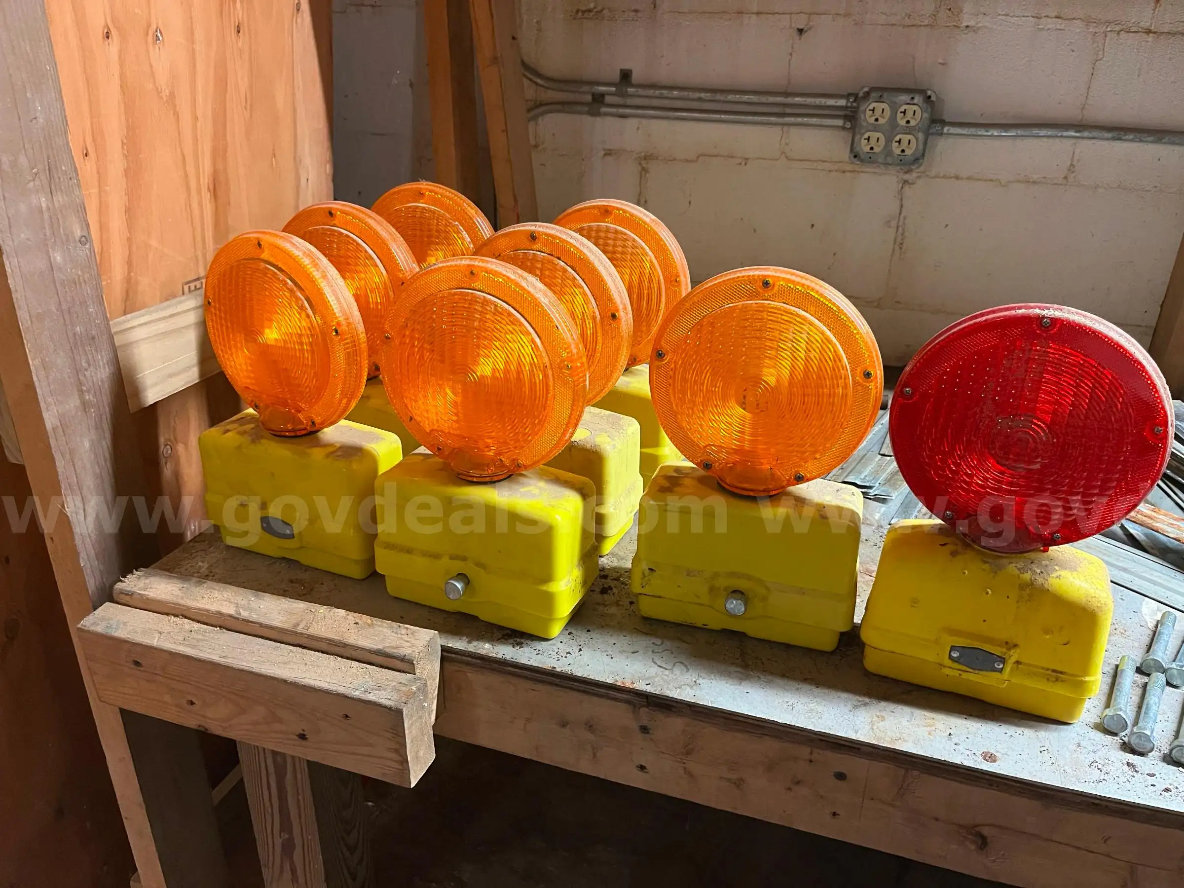 (7) Amber color Barricade Light (6volt battery powered) and (1) Red color Barricade Light (6volt bat