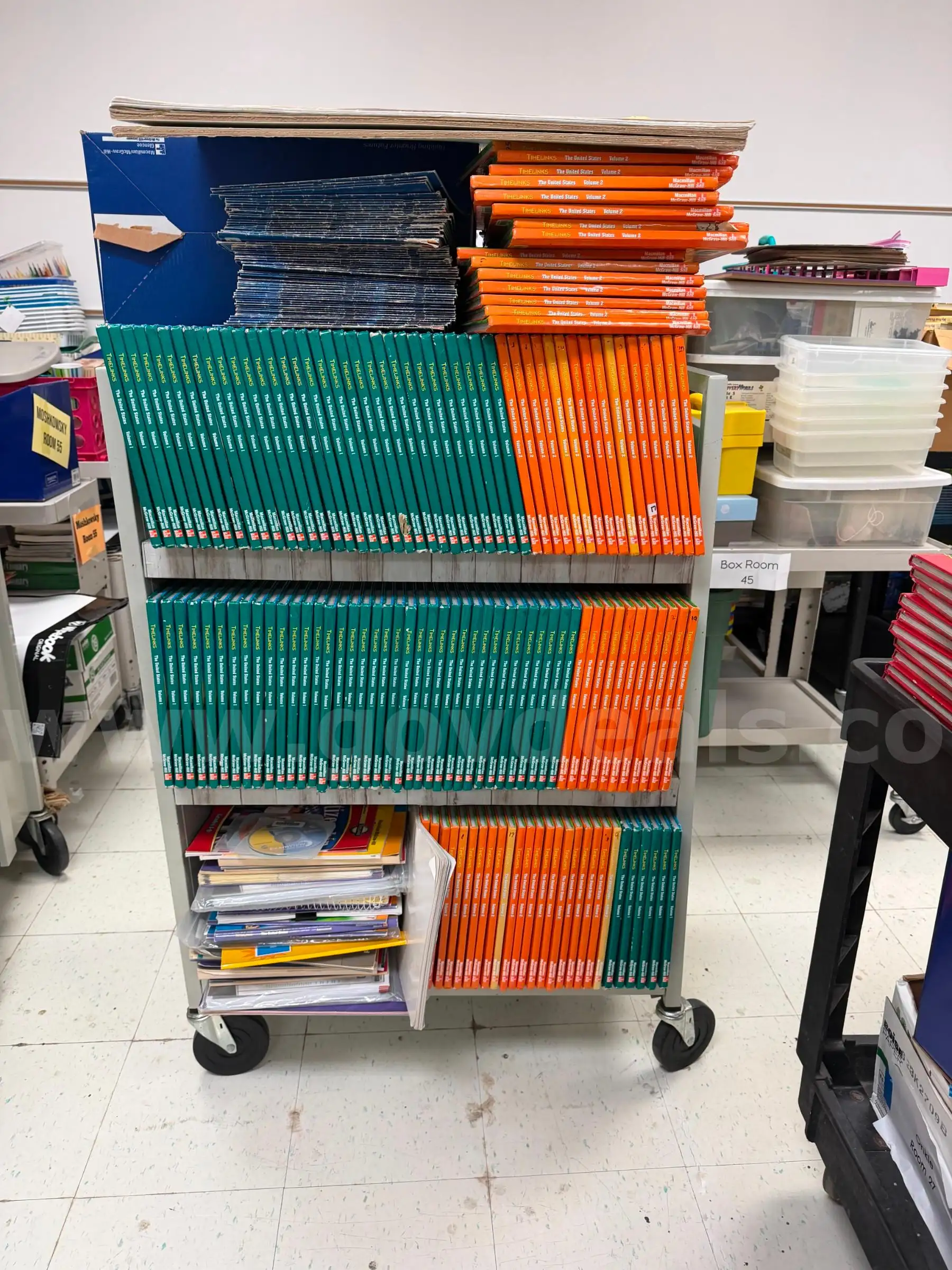 1 lot of various textbooks projector screens and bookends