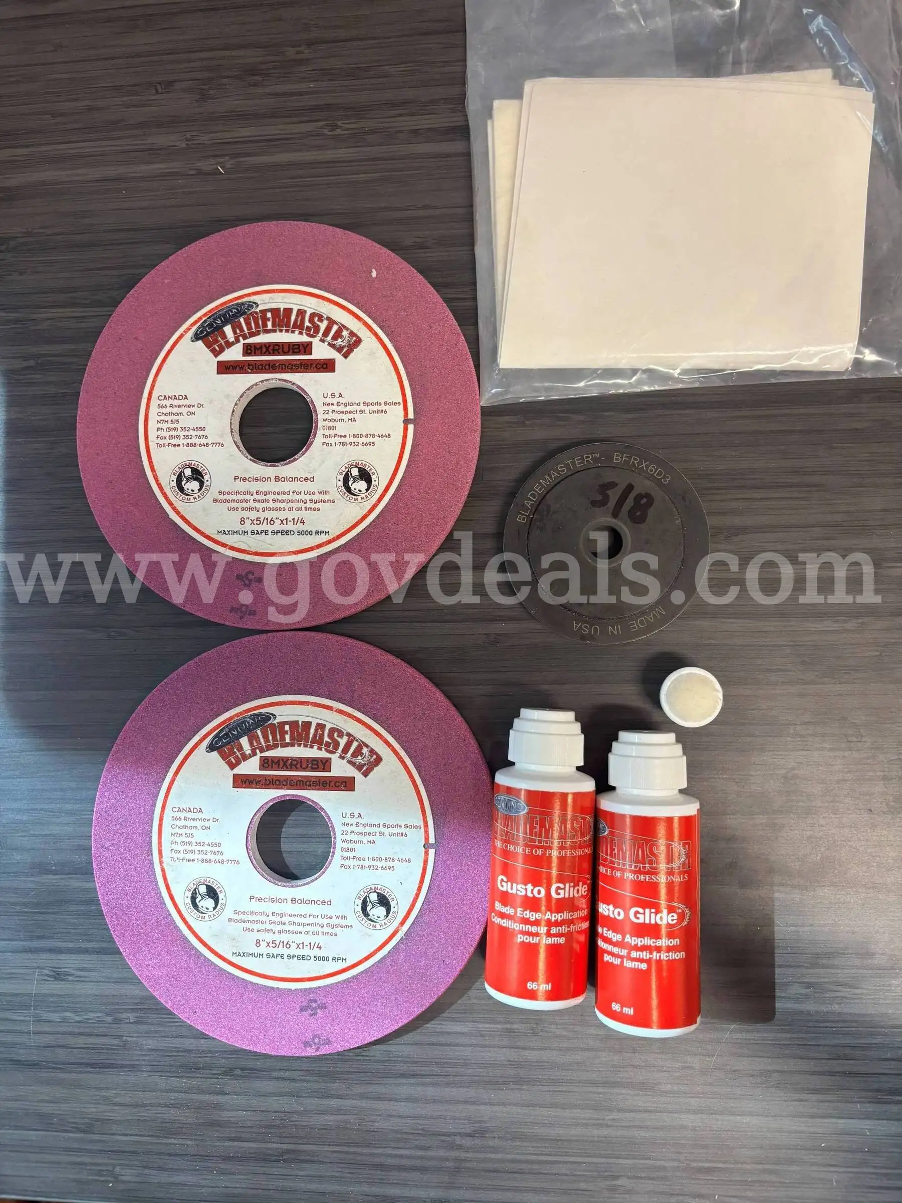 Lot of Blade Master Skate Sharpening Supplies including two 8 wheels 2 containers of Gusto Glide For