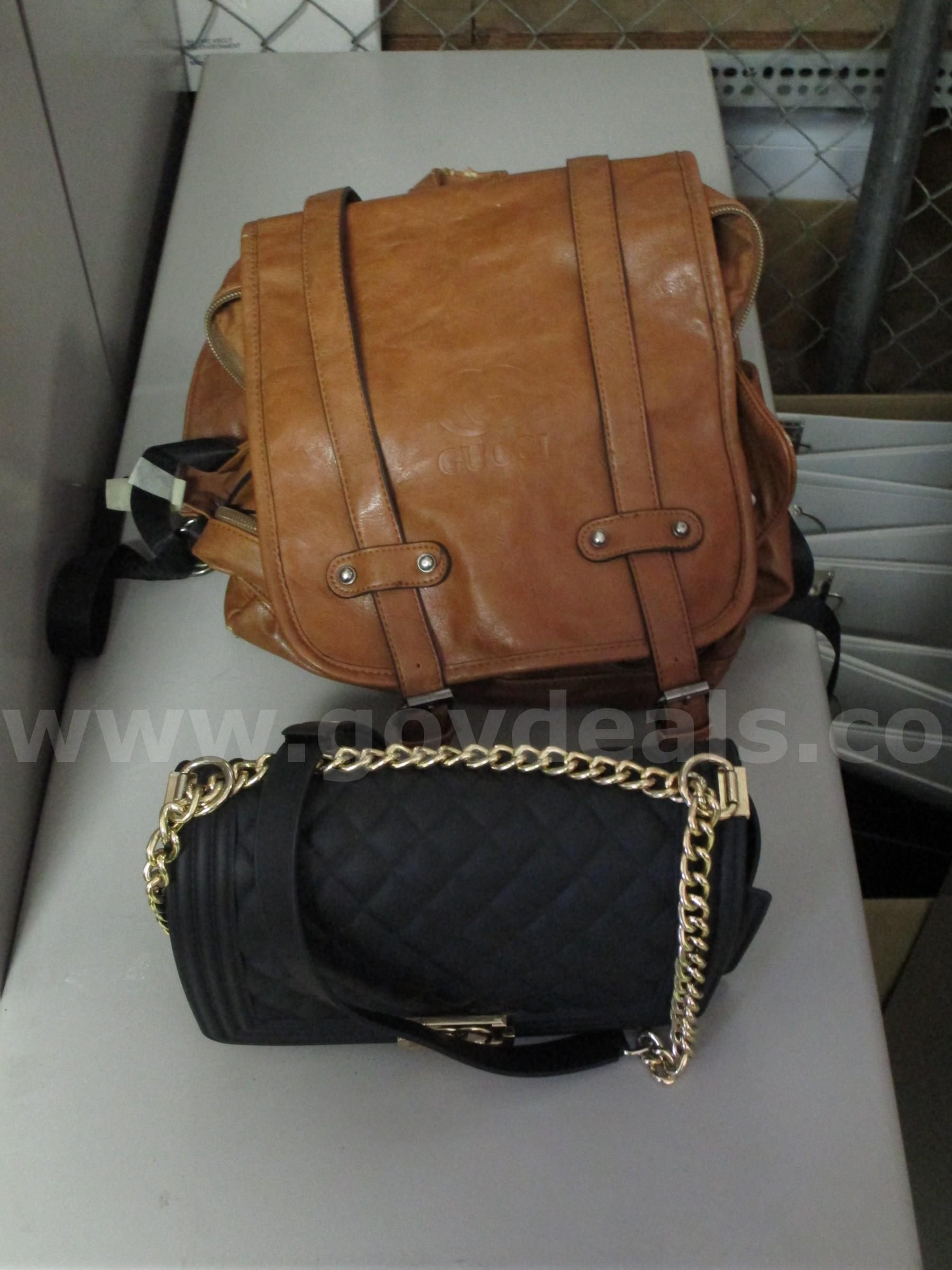 (1) USED DESIGNER BROWN BACKPACK (1) USED DESIGNER BLACK HANDBAG