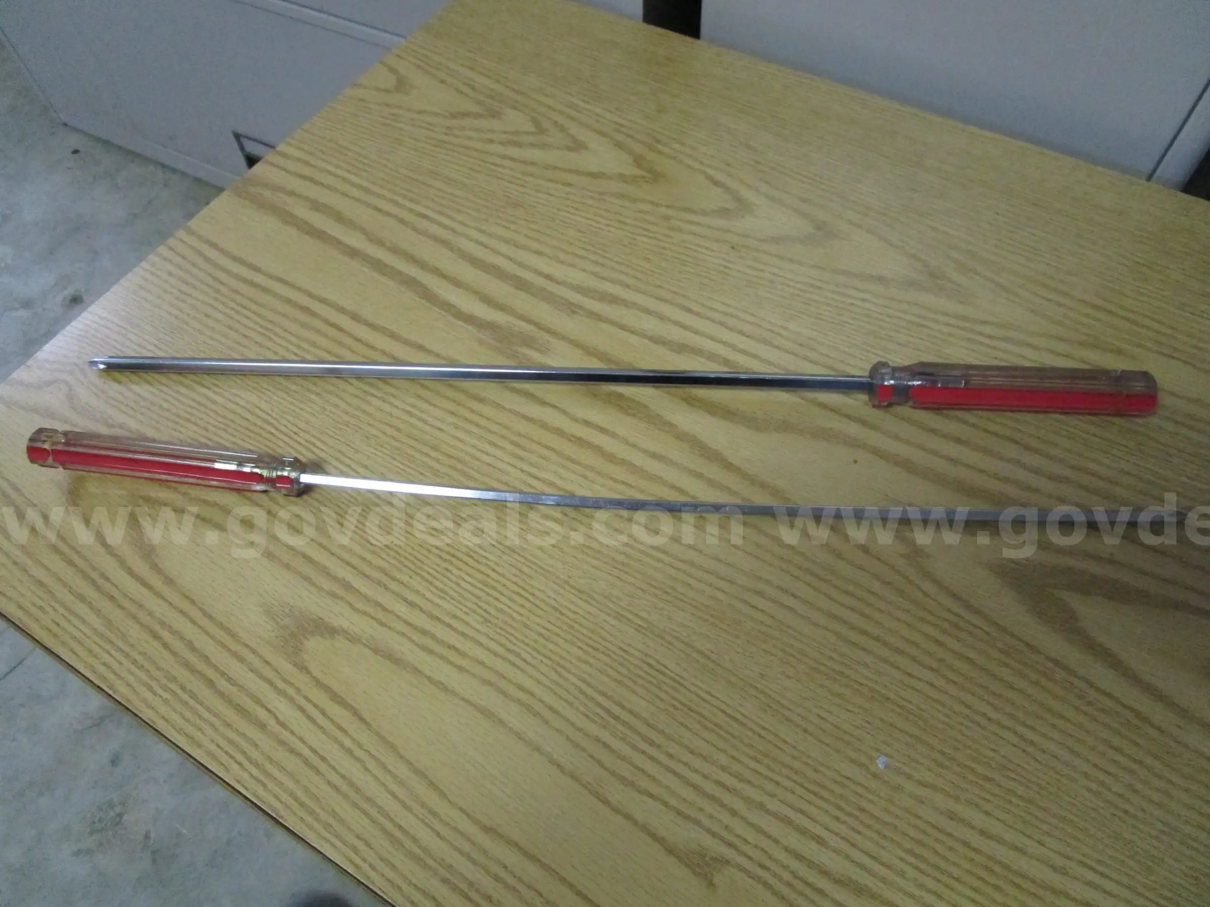 (2) USED 24L PHILLIPS HEAD SCREWDRIVERS ONE BENT