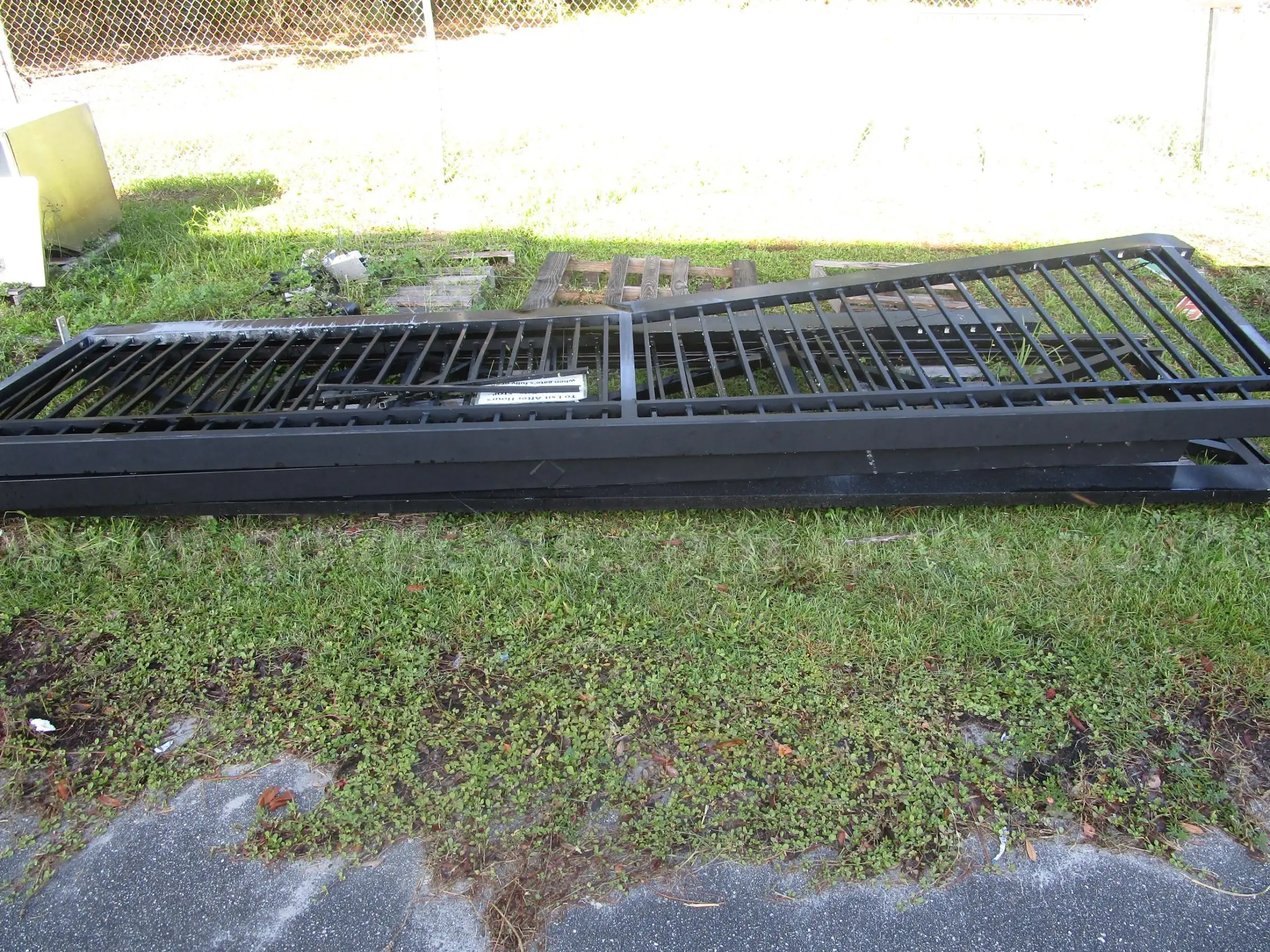 (3) LARGE SECTIONS OF DAMAGED ALUMINUM FENCING