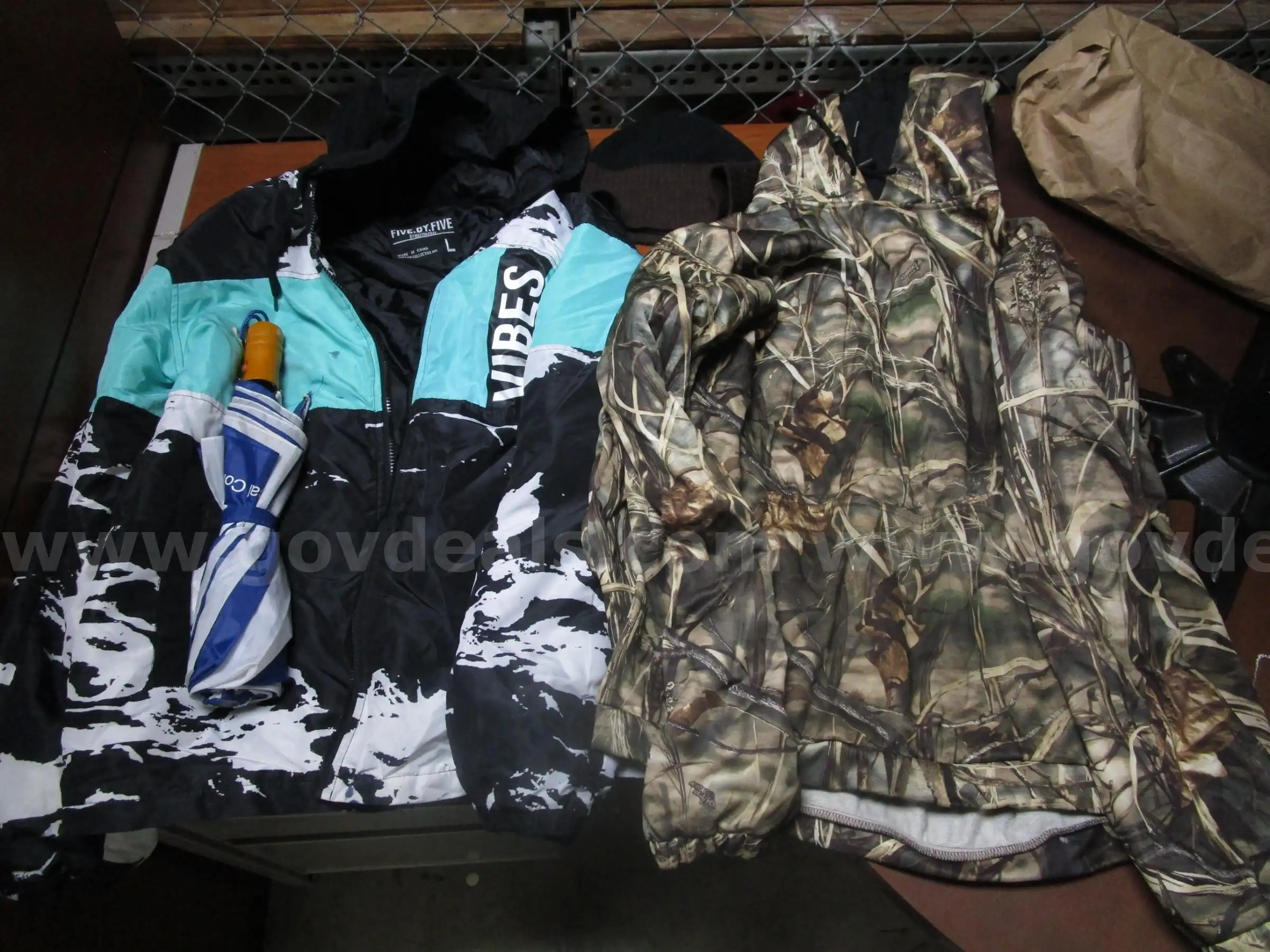 (2) USED JACKETS (1) USED HAT (1) USED UMBRELLA