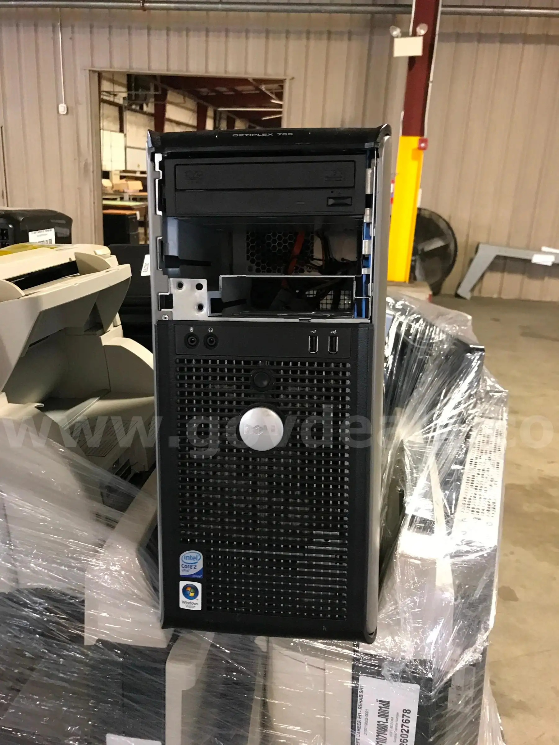 LOT OF COMPUTERS LAPTOP MONITORS AND MISC. ITEMS ON ONE PALLET.