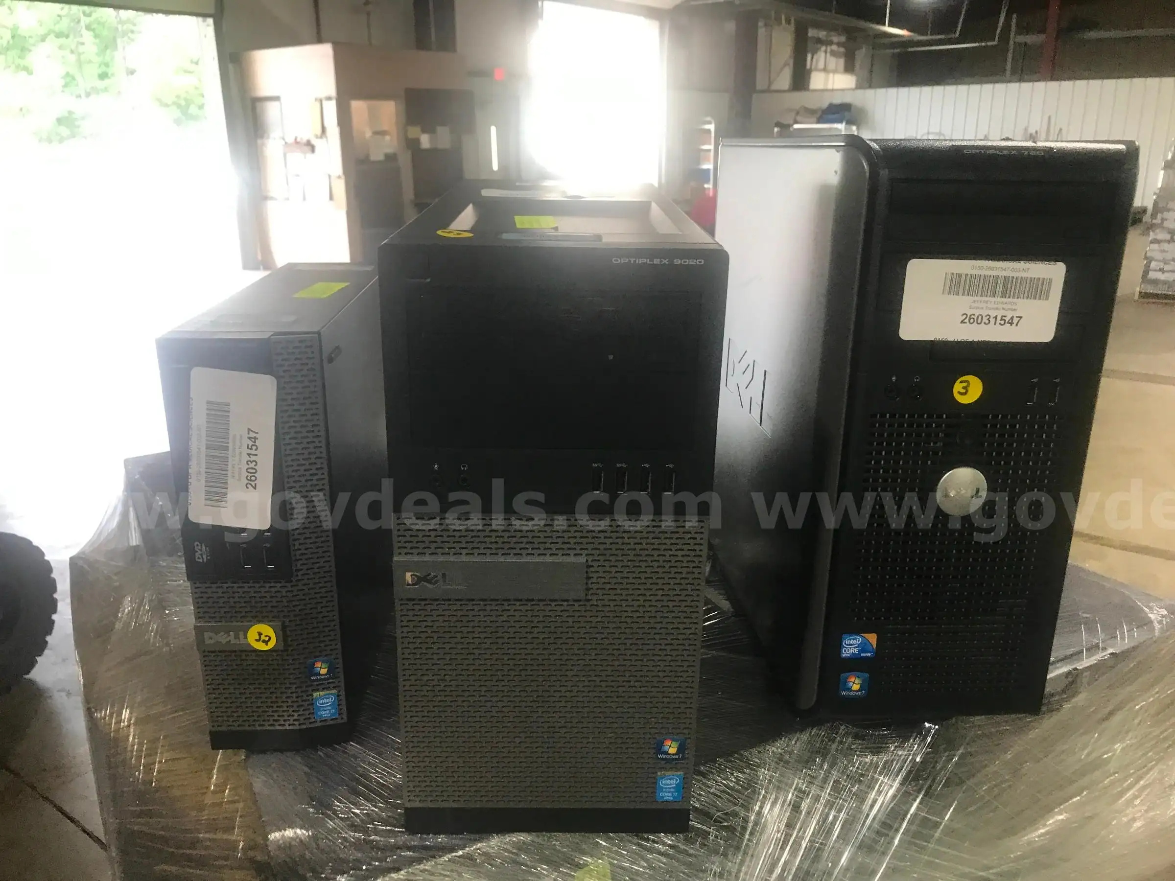 LOT OF COMPUTERS MONITORS AND MISC. ELECTRONICS ON THREE PALLETS.