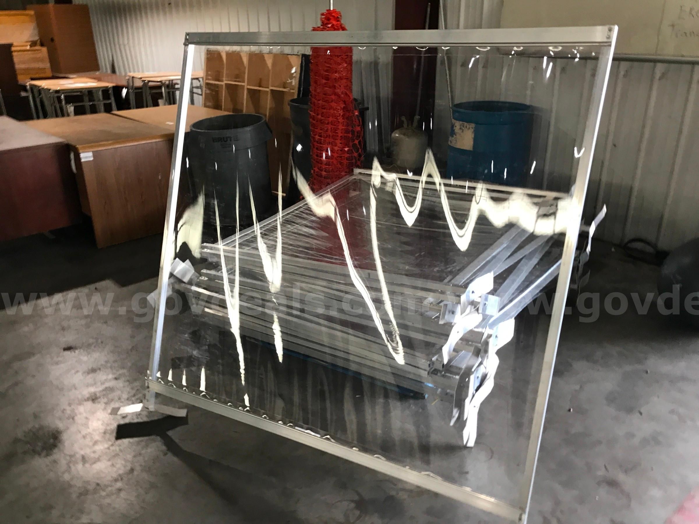 CLEAR PLASTIC DIVIDERS ON ONE PALLET.